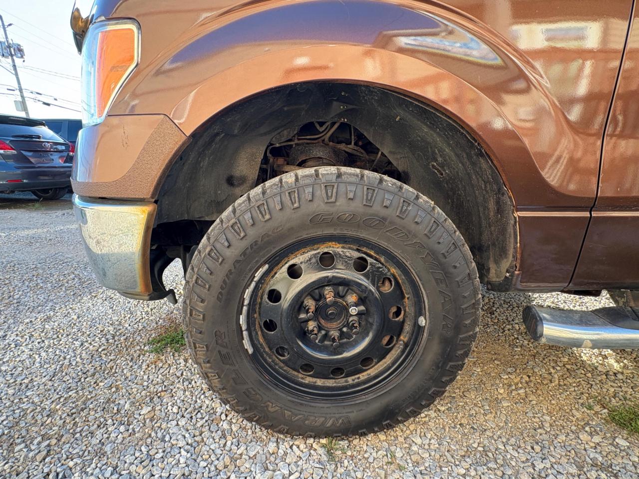 2011 Ford F-150 4WD SUPERCREW 145" XLT Photo