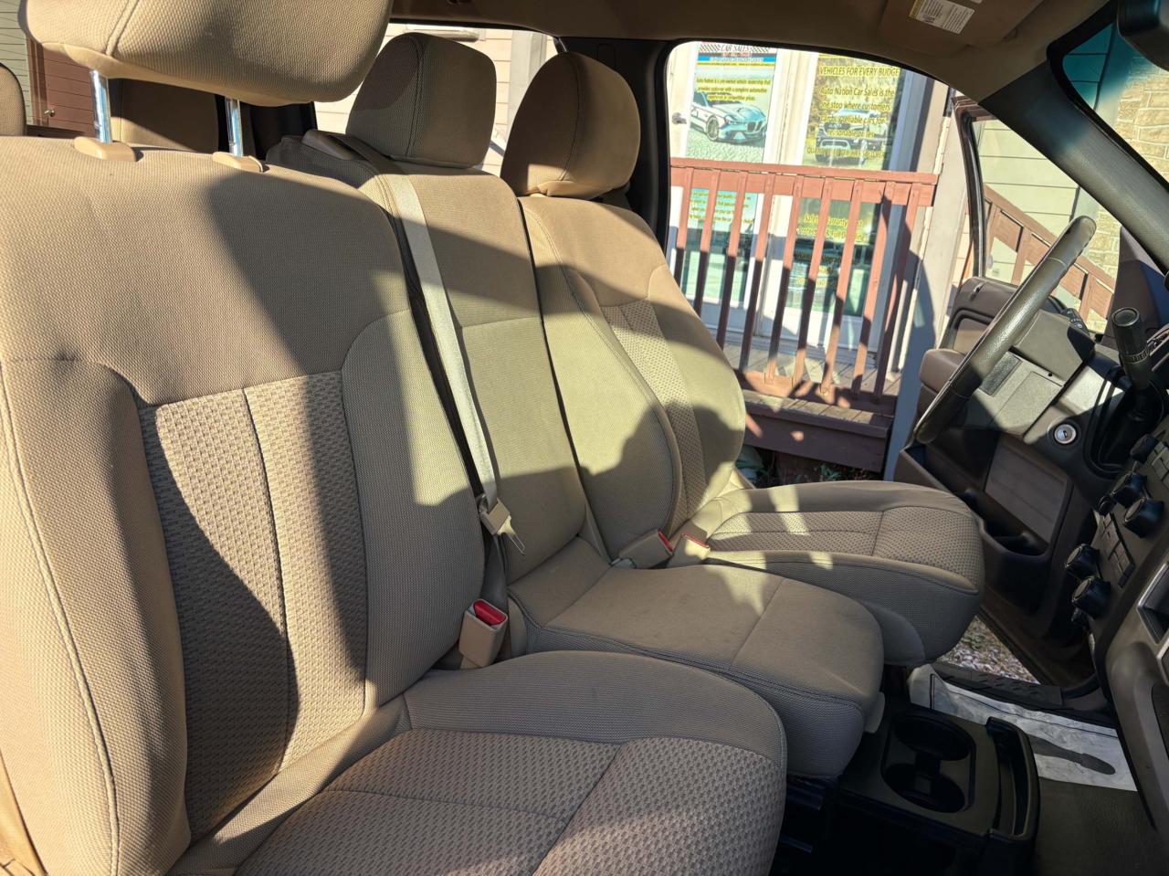 2011 Ford F-150 4WD SUPERCREW 145" XLT Photo