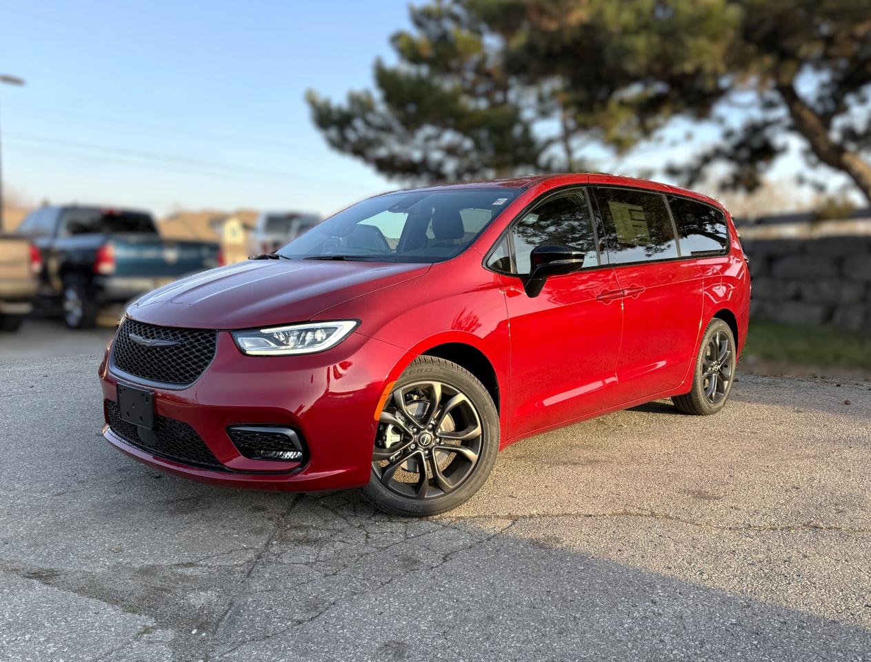 Ready to raise the bar, our New 2026 Chrysler Pacifica Select Minivan in Red Hot Pearl offers easy connectivity, versatile storage, and everyday convenience. Motivated by a 3.6 Litre Pentastar V6 offering 287hp to a 9 Speed Automatic transmission for family-friendly performance. This Front Wheel Drive minivan is also easy to handle, even with a full-house, and it scores approximately 8.4L/100km on the highway. Our Pacifica rides with distinctive design appeal from LED lighting, fog lamps, power-sliding side doors, a power liftgate, a sunroof, and bold alloy wheels.  With exciting adventures ahead, our Select cabin is at your service with heated leatherette front seats, eight-way power for the driver, Stow n Go second-third rows, a heated TechnoLeather steering wheel, tri-zone automatic climate control, Super Console storage, remote start, and keyless access/ignition. A 10.1-inch touchscreen and 7-inch driver display anchor the infotainment system to support wireless Apple CarPlay&reg;, Android Auto&reg;, WiFi compatibility, Bluetooth&reg;, voice command, and a six-speaker sound system. Its a superior interior for families on the go!  Chrysler helps keep your crew safe with front/rear automatic braking, adaptive cruise control, blind-spot monitoring, a rearview camera, lane-departure warning, rear cross-traffic alert, and more. Well-prepared for what comes next, our Pacifica Select awaits your call! Save this Page and Call for Availability. We Know You Will Enjoy Your Test Drive Towards Ownership!