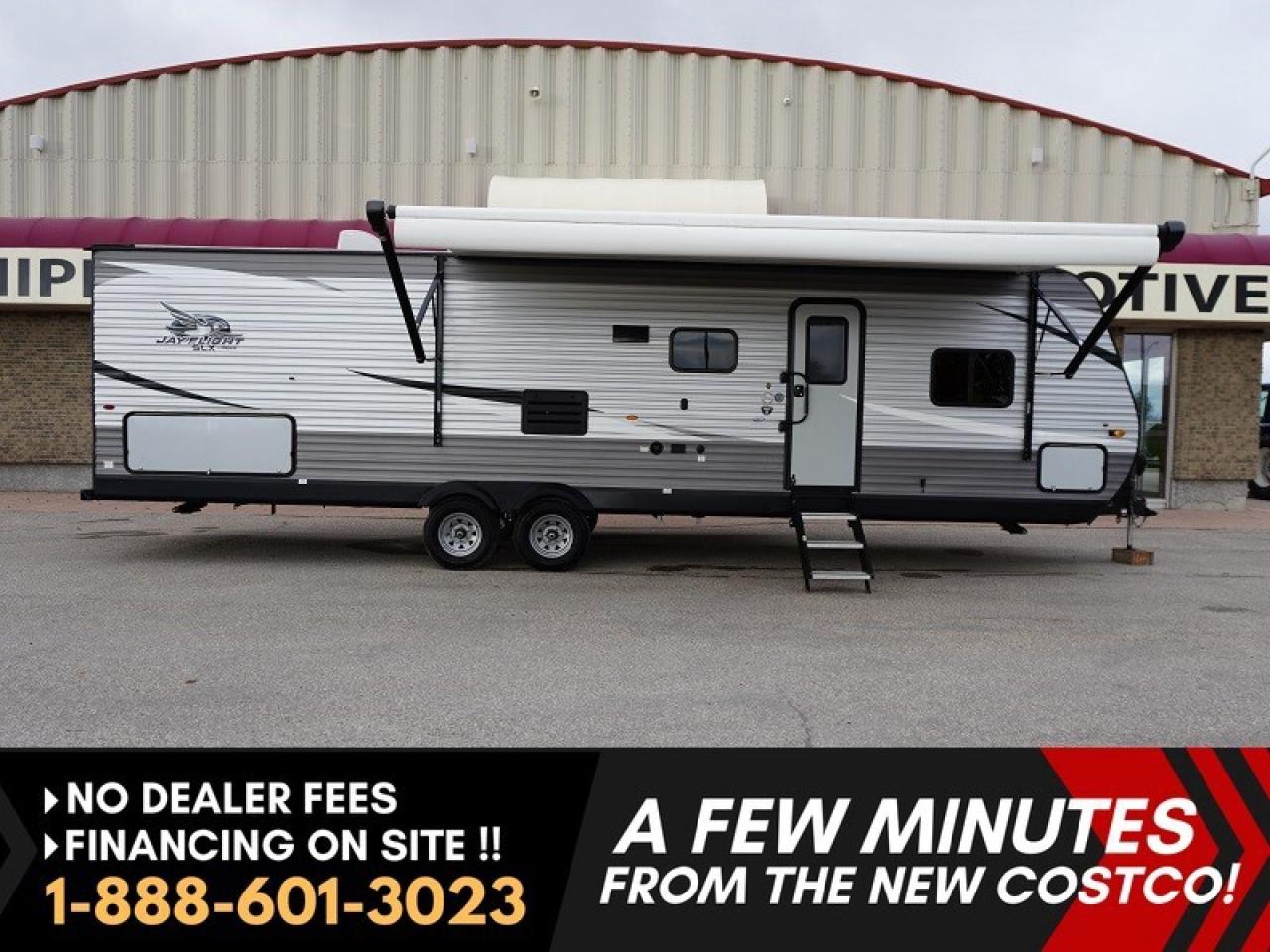 *** Dealer arranged financing on site! Quick, Simple,  no calls or waiting on bank appointments required!! ***   NO ADMINISTRATION FEES!!
 
WOW! WHAT A GREAT FAMILY RV &ndash; LOADED 2021 JAYCO JAY FLIGHT SLX 294QBS QUAD BUNKHOUSE!

Full-size family trailer with space, comfort, and modern design &mdash; ready for adventure!

Here&rsquo;s your chance to own one of the most popular bunkhouse floor plans Jayco ever built &mdash; the 2021 Jay Flight SLX 294QBS! This stunning, modern 35-foot trailer offers a full-size layout, an amazing bunk room, and all the comfort and features you need for family camping or lake-lot living. Lightweight, stylish, and built with Jayco&rsquo;s renowned quality and construction &mdash; this trailer is made to last!

Highlights & Features:

- Lightweight design &ndash; only 6,715 lbs dry! (&frac12;-ton tow able for many trucks/SUVs)
- Sleeps up to 10! &ndash; Quad bunkhouse + full U-shaped dinette + sofa bed + queen master bedroom
- Rear Bunkhouse with Four Bunks &ndash; Perfect for kids, guests, or extended family
- Private Front Bedroom &ndash; Queen bed, dual wardrobes, and privacy doors
- Super Slide-Out &ndash; Expands your living space with large U-dinette and comfy sofa
- Modern Kitchen &ndash; 3-burner cook top/oven, microwave, mid-size fridge, double sink & great counter space
- Spacious Bathroom &ndash; Full-size tub/shower combo with skylight, toilet, sink & exterior entry door
- Entertainment Ready &ndash; TV mount, stereo system with indoor/outdoor speakers
- Full Power Awning with LED lighting
- Outside Kitchen &ndash; Mini fridge, cook top, and prep area
- Power Tongue Jack & Stabilizers
- Solid Entry Steps & Large Pass-Through Storage
- Jayco Magnum Truss Roof System &ndash; Strongest in its class
- Fresh Water: 38 gal | Grey: 39 gal | Black: 39 gal

Floor Plan Overview:

The private front master suite offers comfort and storage with dual wardrobes. The rear quad bunk room gives kids or guests their own space to relax. In the central living area, the large slide-out creates a spacious, open feel with a U-shaped dinette and sofa &mdash; both converting to extra sleeping areas. The modern kitchen features everything you need to cook up a feast, and the exterior kitchen makes outdoor meals a breeze.

Exceptionally clean, well cared for, fully inspected and ready to hit the road! Perfect for families, lake lots, or long road trips &mdash; this 294QBS offers all the space, comfort, and reliability you&rsquo;d expect from Jayco, the #1 selling travel trailer brand in North America!

Don&rsquo;t miss this beautiful quad bunk Jay Flight &mdash; they&rsquo;re hard to find in this condition! Call or visit today &mdash; your next adventure starts here! 

***EXTENDED WARRANTY options available to choose from to protect your RV and your wallet. (HUGE VALUE!!!) Zero down financing OAC with very Low monthly payments avail. Please see dealer for details. Trades accepted. View at Winnipeg West Automotive Group, 5195 Portage Ave. Dealer permit # 4365, Call now 1-(888) 601-3023.