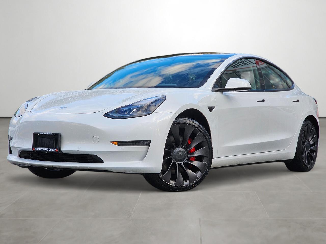 2021 Tesla Model 3 Sedan / Dual Motor All-Wheel-Drive / Performance / Autopilot. This vehicle is a manager demo and is driven daily, so mileage will be greater than currently advertised. If you are interested in this vehicle, please call to ensure it will be at the dealership when you would like to see it.

The 2021 Tesla Model 3 Performance is an all-electric sport sedan that delivers exhilarating speed, cutting-edge technology, and everyday practicality. Finished in White, its sleek aerodynamic design emphasizes Teslas modern, minimalist aesthetic. Equipped with Dual Motor All-Wheel-Drive, it provides blistering acceleration, agile handling, and confidence in all conditions. Inside, the cabin is refined with Premium Black Leather and anchored by Teslas signature touchscreen interface, seamlessly controlling navigation, entertainment, and vehicle settings. 

CarFax report and Safety inspection available for review. Large used car inventory! Open 7 days a week! IN HOUSE FINANCING available. Close to 100% approval rate. We accept all local and out of town trade-ins.    For additional vehicle information or to schedule your appointment, call us or send an inquiry.   Pricing is subject to $995 doc fee, prep fee from $195 to $1395, and $10 VSA levy.  Financed vehicles subject to $599 finance placement fee. We also specialize in out of town deliveries. This vehicle may be located at one of our other lots, please call to book an appointment to ensure the vehicle is available.