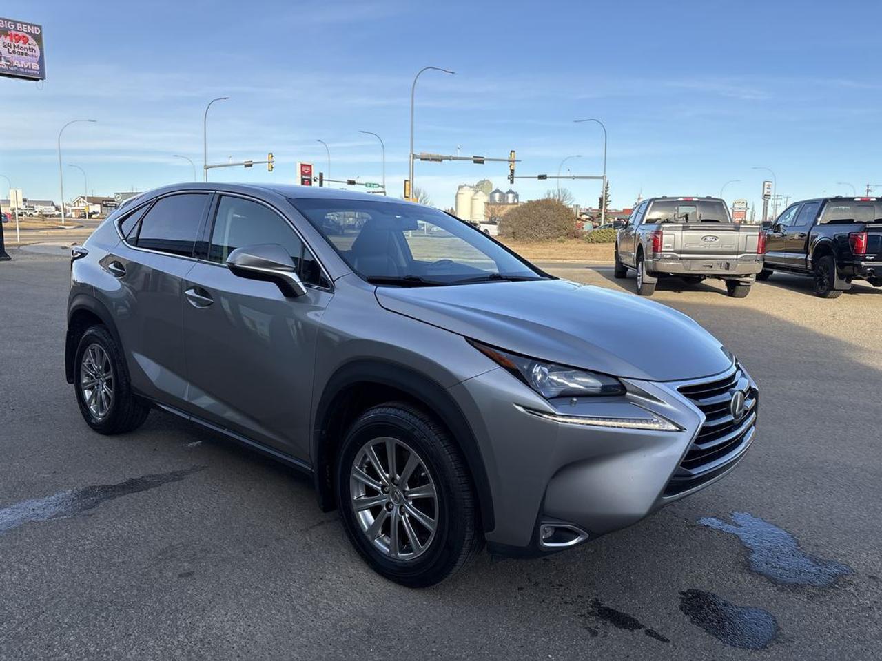 THE PRICE YOU SEE, PLUS GST. GUARANTEED!2.0 LITER ENGINE, 8 SPEED AUTO, PREMIUM SEATING, ADAPTIVE CRUISE, PREMIUM AUDIO.The 2017 Lexus NX 200t, equipped with a 2.0-liter turbocharged 4-cylinder engine, is a compact luxury SUV known for its stylish design, refined interior, and smooth performance. It generates around 235 horsepower and 258 lb-ft of torque, delivering a responsive driving experience with its turbocharged powertrain. The vehicle features an 8-speed automatic transmission that provides seamless shifts and contributes to improved fuel efficiency, which averages around 22 mpg in the city and 28 mpg on the highway. The NX 200t boasts a sleek, modern exterior design with bold lines and a distinctive spindle grille, complemented by a luxurious interior that includes high-quality materials, advanced technology, and comfortable seating. Standard features often include a 7-inch touchscreen infotainment system, Bluetooth connectivity, a premium audio system, and Lexuss Safety System+ package, offering driver assistance features such as adaptive cruise control, lane departure warning, and pre-collision systems. Overall, the 2017 Lexus NX 200t combines luxury, practicality, and performance, making it an appealing choice for those seeking a premium compact SUV with a sporty edge.Do you want to know more about this vehicle, CALL, CLICK OR COME ON IN!*AMVIC Licensed Dealer; CarFax and Full Mechanical Inspection Included.