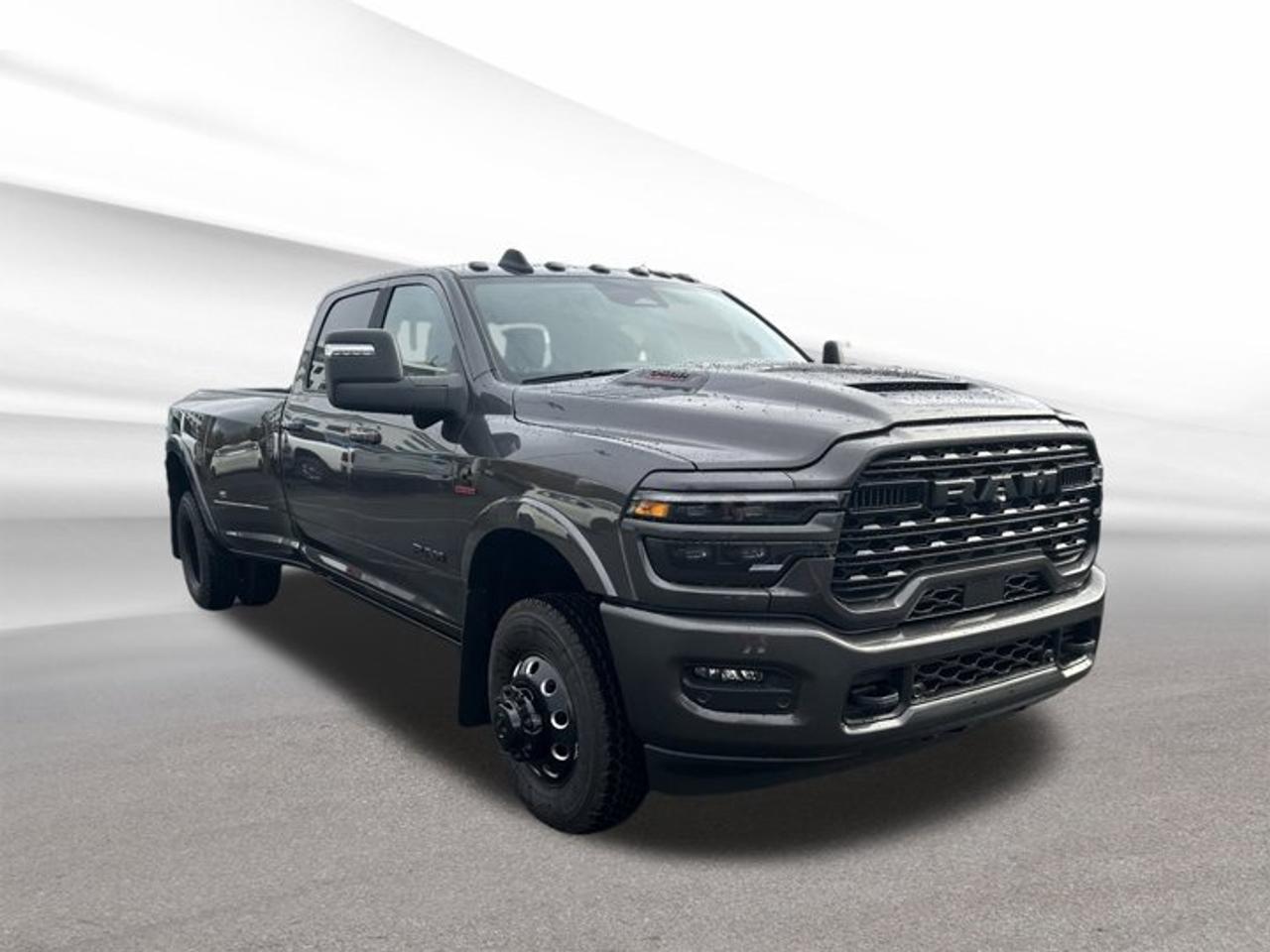 Experience the power and luxury of the brand new 2026 RAM 3500 Limited, now available at Steele Halifax Chrysler Dodge Jeep Ram FIAT in Halifax. This full-size truck combines a bold grey exterior with a refined black interior, offering unmatched capability and comfort. Featuring a robust Intercooled Turbo Diesel I-6 6.7 L engine and advanced 4-wheel drive, the RAM 3500 Limited is engineered for those who demand the very best in performance and style.TRUCK FEATURESExceptional towing capacity for heavy-duty haulingDurable 4-wheel drive for all-terrain confidenceSpacious 4-door cab for easy passenger accessHigh-strength cargo bed for versatile loadingADVANCED SAFETY FEATURESComprehensive airbag system for enhanced protectionAdvanced traction control for stable drivingRearview camera for improved visibilityElectronic stability control for safer handlingPERFORMANCE AND EFFICIENCYIntercooled Turbo Diesel I-6 6.7 L engineSmooth-shifting automatic transmissionImpressive torque for demanding tasksEfficient diesel power for long haulsCOMFORT AND CONVENIENCESpacious black interior with premium finishesAutomatic climate control for year-round comfortPower-adjustable drivers seat for personalized supportEasy-access keyless entry systemTECHNOLOGY AND CONNECTIVITYIntegrated infotainment system with touchscreen displayBluetooth hands-free connectivity for safer callsMultiple USB ports for device chargingPremium sound system for immersive audioCARGO SPACELarge cargo bed for heavy equipment or suppliesMultiple storage compartments in the cabinFoldable rear seats for extra spaceWide-opening doors for easy loadingWHAT OTHER OWNERS LIKEOutstanding towing and hauling capabilitiesSmooth, comfortable ride for a heavy-duty truckUser-friendly technology and controlsLuxurious and spacious interior designThis 2026 RAM 3500 Limiteds VIN is: 3C63RRRL0TG168409.