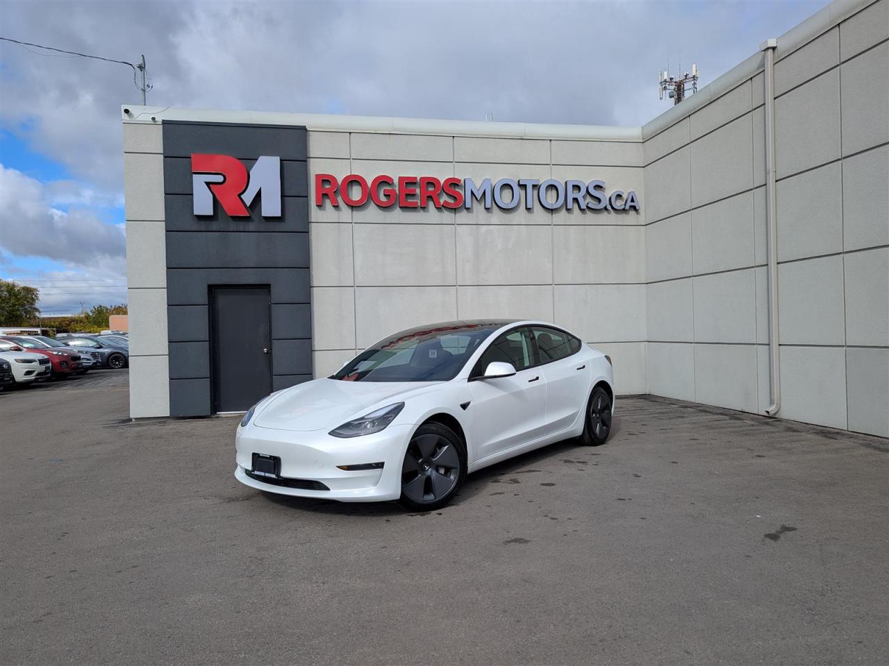 Photo of White 2021 Tesla Model 3