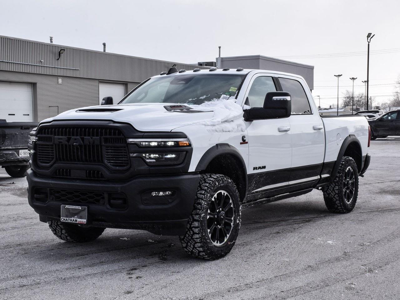 <p>The 2026 Ram 2500 Rebel 4x4 Crew Cab 6'4" Box in stunning white is built to tackle any terrain with confidence and style. This 4×4 powerhouse is equipped for both the rugged outdoors and urban streets, providing an outstanding driving experience.</p> <p>Its bold and aggressive exterior is complemented by alloy wheels, giving it a commanding presence on the road. The interior offers a matching white color scheme, featuring premium materials with a focus on comfort and durability. The trucks spacious cabin includes power seats and windows, ensuring every journey is as comfortable as possible.</p> <p>In terms of technology, the Ram 2500 leads with its state-of-the-art navigation system and smart device integration, keeping you connected wherever you go. A suite of safety features like lane assist, brake assist, adaptive cruise control, and parking sensors ensures peace of mind during your drives. The heated seats and steering wheel, along with a heated mirror feature, add a layer of comfort and convenience, especially in chilly Canadian weather.</p> <p>This robust truck is perfect for adventurers, outdoor enthusiasts, and anyone who needs a reliable and powerful vehicle for both work and play. Dont miss out on your chance to own this capable machine. Contact the dealership today for more information and to arrange a test drive.</p>