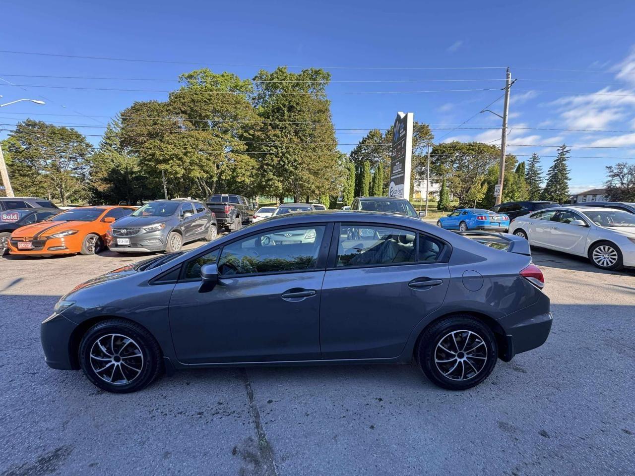 2015 Honda Civic 4dr Man LX Photo3