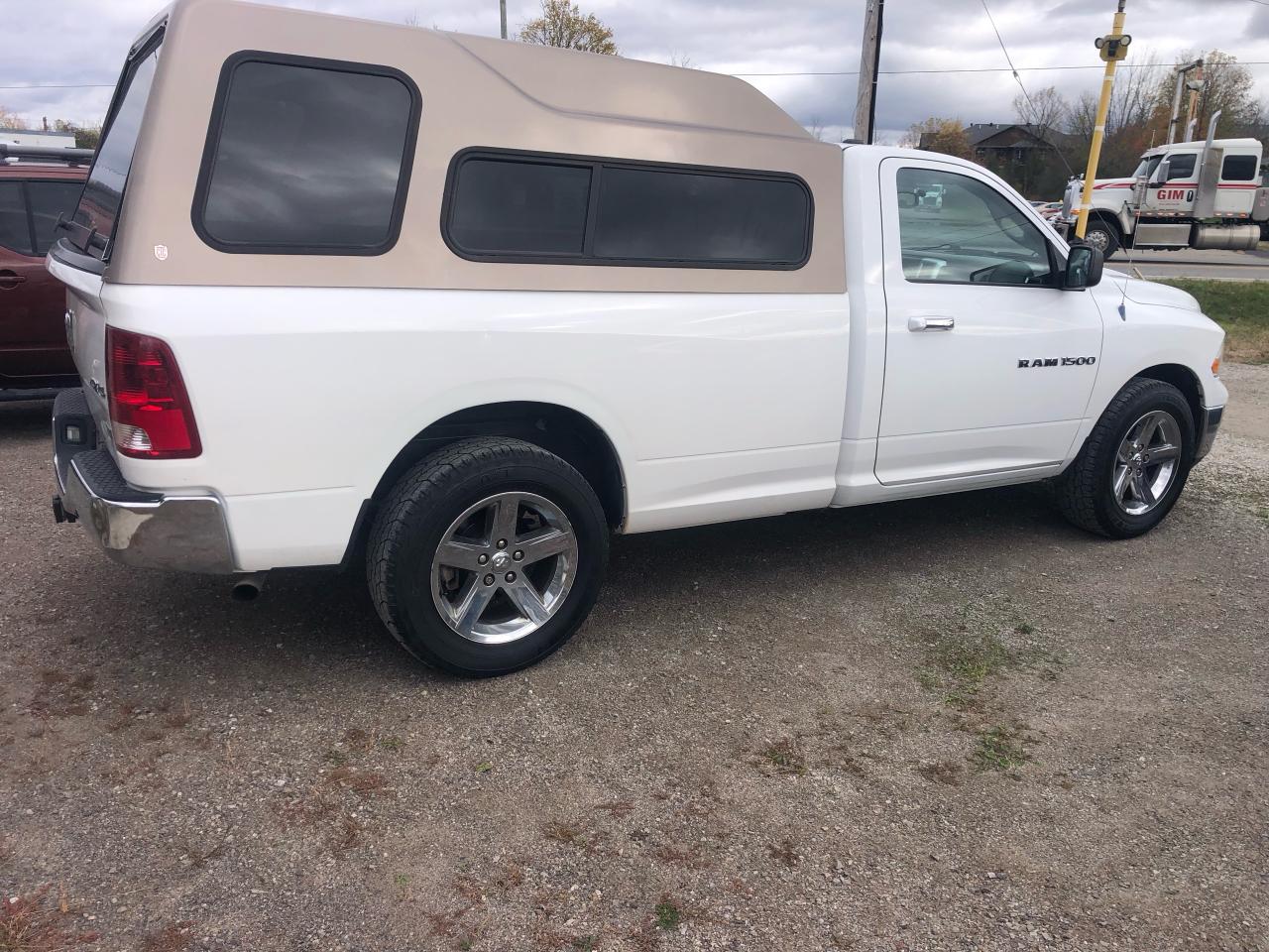 2011 RAM 1500 4WD Reg Cab 140.5" SLT - Photo #4