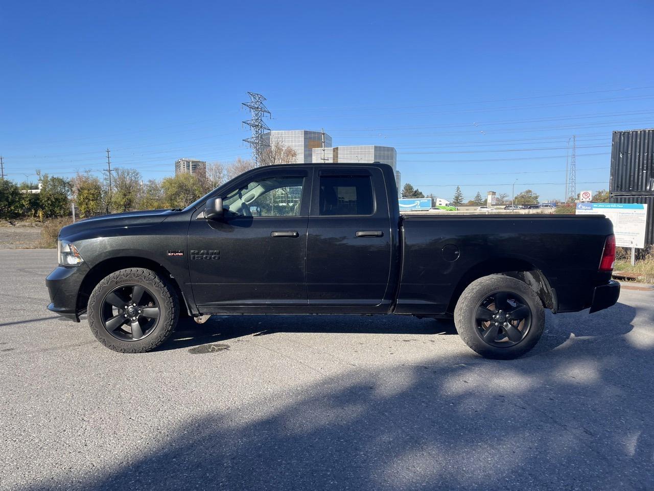 2018 RAM 1500 Tradesman Quad Cab 4WD - Photo #2