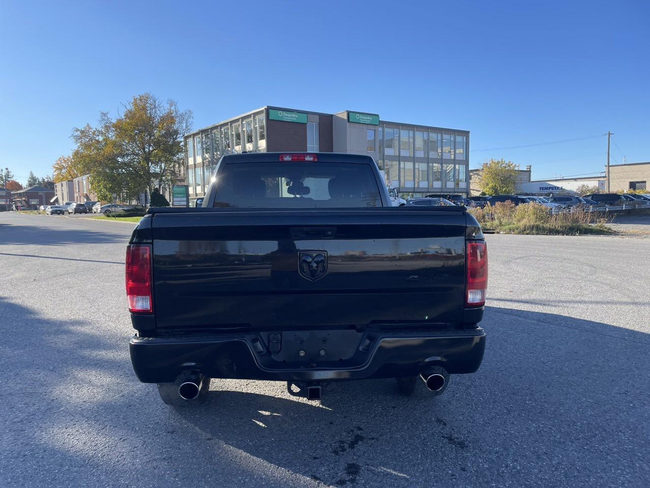2018 RAM 1500 Tradesman Quad Cab 4WD - Photo #4