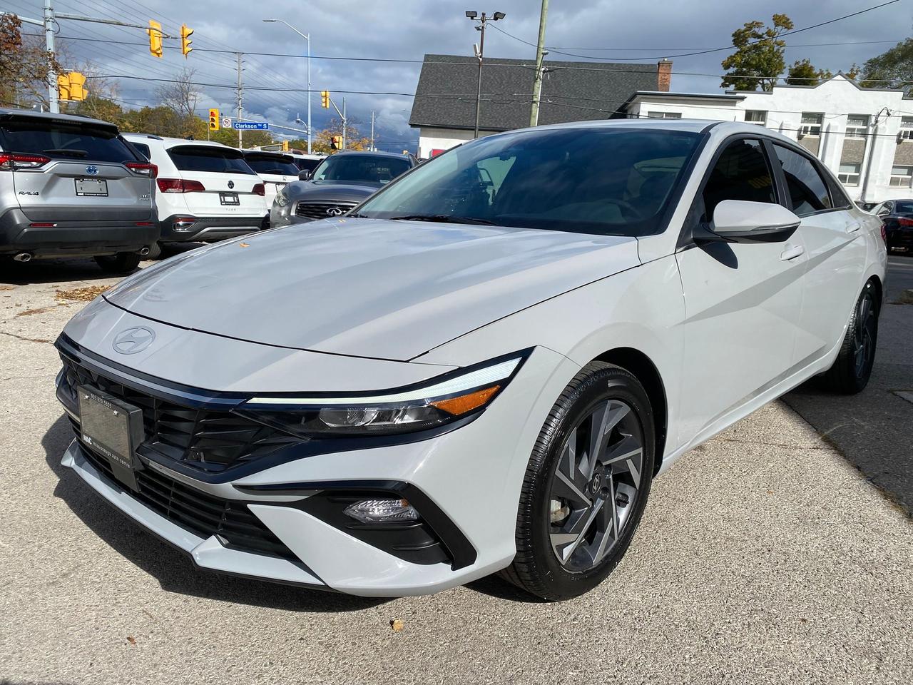 <p data-path-to-node=1><strong data-path-to-node=1 data-index-in-node=0>2024 Hyundai Elantra Limited Hybrid &ndash; Cyber Grey &ndash; 46,300 KM</strong></p><p data-path-to-node=2><strong data-path-to-node=2 data-index-in-node=0>Description:</strong> Experience the perfect balance of cutting-edge efficiency and premium comfort with this <strong data-path-to-node=2 data-index-in-node=101>2024 Hyundai Elantra Limited Hybrid</strong>. Finished in the striking <strong data-path-to-node=2 data-index-in-node=163>Cyber Grey</strong>&mdash;a modern, flat grey tone that gives the car a high-tech, custom look&mdash;over a sophisticated <strong data-path-to-node=2 data-index-in-node=264>Black Leather</strong> interior.</p><p data-path-to-node=3>With <strong data-path-to-node=3 data-index-in-node=5>46,300 km</strong>, this hybrid is powered by a 1.6L GDI 4-cylinder engine paired with a 32kW electric motor and a smooth 6-speed dual-clutch transmission. Unlike many hybrids that use a CVT, this Elantra provides a traditional, crisp shifting feel while delivering exceptional fuel economy. The Limited trim ensures you dont sacrifice any amenities, offering a high-definition digital cockpit and a suite of advanced driver assistance features.</p><p data-path-to-node=4><strong data-path-to-node=4 data-index-in-node=0>Pricing & Transparency:</strong></p><ul data-path-to-node=5><li><p data-path-to-node=5,0,0><strong data-path-to-node=5,0,0 data-index-in-node=0>Certified:</strong> This vehicle is sold fully certified following a comprehensive safety inspection.</p></li><li><p data-path-to-node=5,1,0><strong data-path-to-node=5,1,0 data-index-in-node=0>All-In Pricing:</strong> Our price includes the <strong data-path-to-node=5,1,0 data-index-in-node=39>Admin Fee</strong> and <strong data-path-to-node=5,1,0 data-index-in-node=53>OMVIC fee</strong>.</p></li><li><p data-path-to-node=5,2,0><em data-path-to-node=5,2,0 data-index-in-node=0>Note: Price is plus HST and Licensing.</em></p></li></ul><p data-path-to-node=6><strong data-path-to-node=6 data-index-in-node=0>Performance & Fuel Consumption:</strong></p><ul data-path-to-node=7><li><p data-path-to-node=7,0,0><strong data-path-to-node=7,0,0 data-index-in-node=0>Engine:</strong> 1.6L GDI Hybrid 4-Cylinder (139 Combined HP / 195 lb-ft Torque)</p></li><li><p data-path-to-node=7,1,0><strong data-path-to-node=7,1,0 data-index-in-node=0>Transmission:</strong> 6-Speed EcoShift Dual-Clutch (DCT)</p></li><li><p data-path-to-node=7,2,0><strong data-path-to-node=7,2,0 data-index-in-node=0>Drivetrain:</strong> Front-Wheel Drive (FWD)</p></li><li><p data-path-to-node=7,3,0><strong data-path-to-node=7,3,0 data-index-in-node=0>City Efficiency:</strong> 4.8 L/100km</p></li><li><p data-path-to-node=7,4,0><strong data-path-to-node=7,4,0 data-index-in-node=0>Highway Efficiency:</strong> 4.5 L/100km</p></li><li><p data-path-to-node=7,5,0><strong data-path-to-node=7,5,0 data-index-in-node=0>Combined Efficiency:</strong> 4.7 L/100km</p></li></ul><p data-path-to-node=8><strong data-path-to-node=8 data-index-in-node=0>Key Build Options & Features:</strong></p><ul data-path-to-node=9><li><p data-path-to-node=9,0,0><strong data-path-to-node=9,0,0 data-index-in-node=0>Technology:</strong> Dual 10.25-inch screens (fully digital instrument cluster and high-resolution navigation) with Bose Premium Audio and 8 speakers.</p></li><li><p data-path-to-node=9,1,0><strong data-path-to-node=9,1,0 data-index-in-node=0>Safety:</strong> Hyundai SmartSense with Adaptive Cruise Control (Stop & Go), Forward Collision-Avoidance with Junction-Turning Detection, and Highway Driving Assist.</p></li><li><p data-path-to-node=9,2,0><strong data-path-to-node=9,2,0 data-index-in-node=0>Interior Luxury:</strong> Premium Black Leather seating surfaces, heated and ventilated front seats, and a heated leather-wrapped steering wheel.</p></li><li><p data-path-to-node=9,3,0><strong data-path-to-node=9,3,0 data-index-in-node=0>Convenience:</strong> Power sunroof, Wireless Device Charging, Proximity Key with Push-Button Start, and the Hyundai Digital Key system.</p></li><li><p data-path-to-node=9,4,0><strong data-path-to-node=9,4,0 data-index-in-node=0>Exterior:</strong> LED headlights and taillights, dark chrome grille accents, and 17-inch hybrid-specific alloy wheels.</p></li></ul><p data-path-to-node=10><strong data-path-to-node=10 data-index-in-node=0>Location:</strong> Mississauga, ON <strong data-path-to-node=10 data-index-in-node=26>Contact:</strong> 905-823-5535 | sales@mac.ca</p>