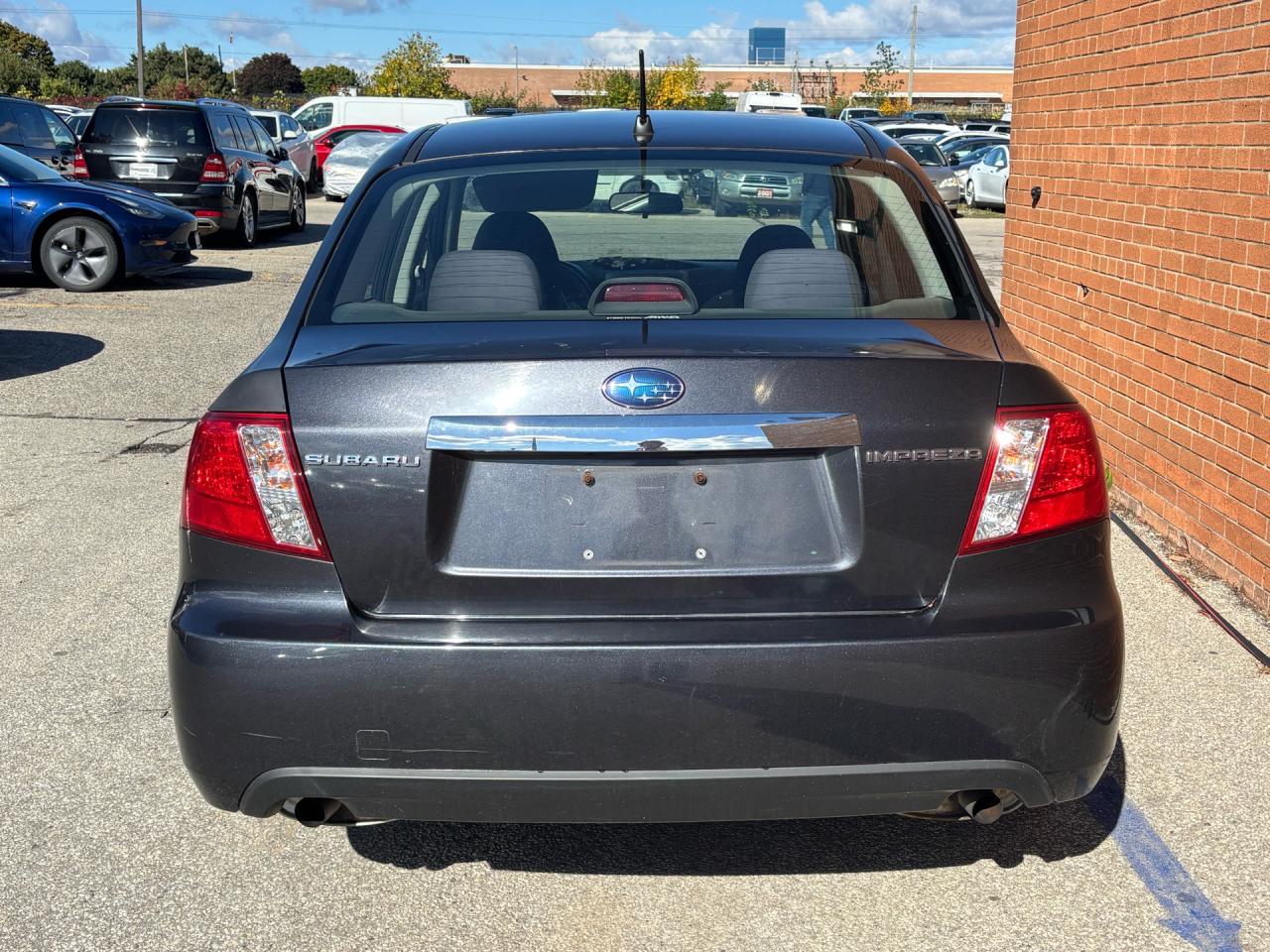 2009 Subaru Impreza 4dr Sdn Auto 2.5i Photo4