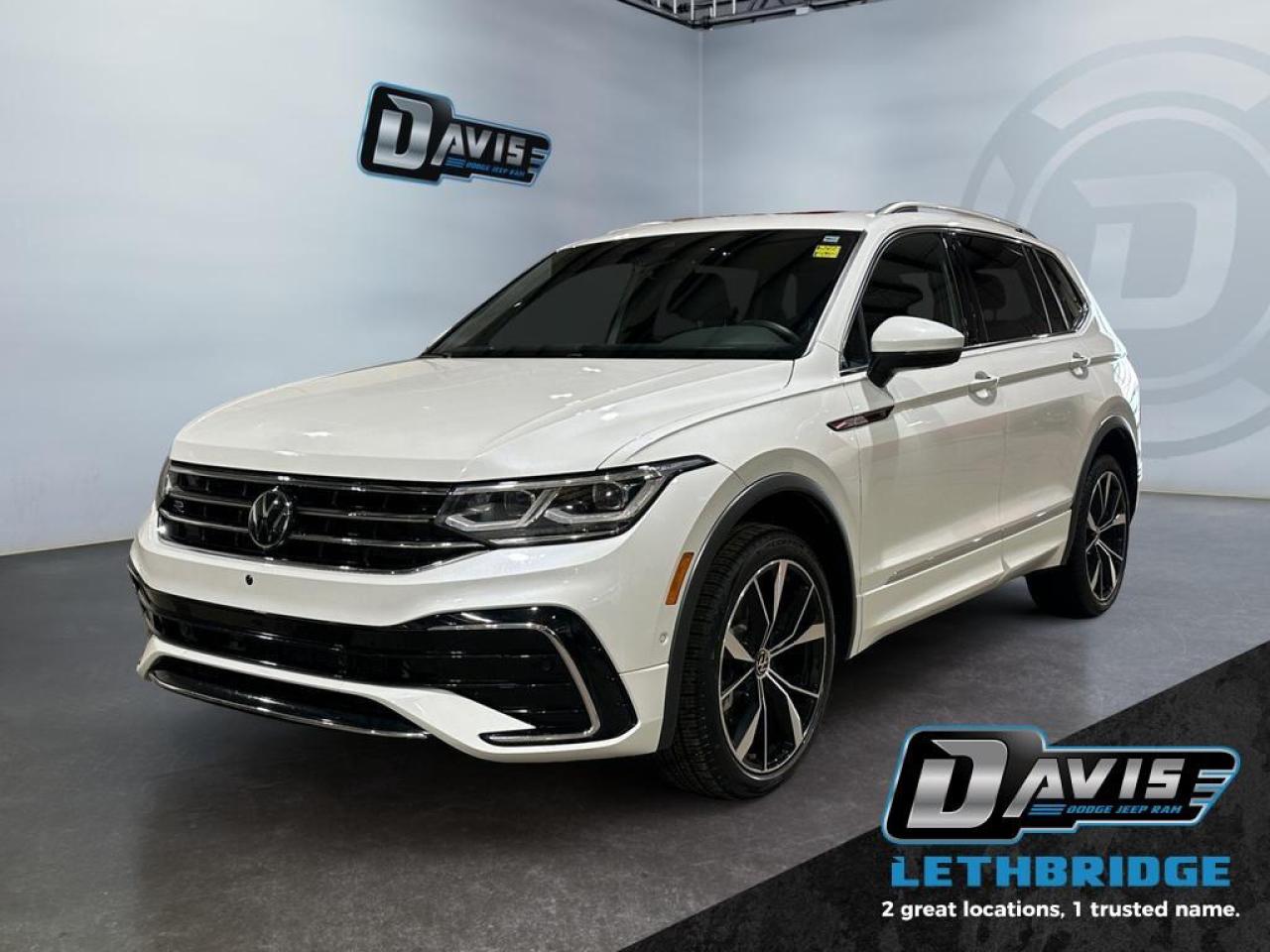 <b>AWD - Leather - 360 Camera - Panoramic Sunroof - Vented & Heated Seats - Navigation - Local Trade In! <br /> <br /></b><br /> Designed with you in mind, this 2024 Tiguan does more than offer tons of tech, it makes it all easy to use. This 2024 Volkswagen Tiguan is for sale today in Lethbridge. <br /> <br />Whether it's a weekend warrior or the daily driver this time, this 2024 Tiguan makes every experience easier to manage. Cutting edge tech, both inside the cabin and under the hood, allow for safe, comfy, and connected rides that keep the whole party going. The crossover of the future is already here, and it's called the Tiguan. This SUV has 37,989 km. Stock number 40713 is Oryx White Pearl in colour. It has an Automatic transmission and is powered by a 184HP 2.0L 4 Cylinder Engine. <br /> <br /> Our Tiguan's trim level is Highline R-Line. This range-topping Tiguan Highline R-Line is fully-loaded with ventilated and heated leather-wrapped seats with power adjustment, lumbar support and memory function, a heated leather-wrapped steering wheel, an 8-speaker Fender audio system with a subwoofer, adaptive cruise control, a 360-camera with aerial view, park distance control with automated parking sensors, and remote engine start. Additional features include an express open/close sunroof with tilt and slide functions and a power sunshade, rain detecting wipers with heated jets, a power liftgate, 4G LTE mobile hotspot internet access, and an 8-inch infotainment screen with satellite navigation, wireless Apple CarPlay and Android Auto, and SiriusXM streaming radio. Safety features also include blind spot detection, lane keep assist, lane departure warning, VW Car-Net Safe & Secure, forward and rear collision mitigation, and autonomous emergency braking. This vehicle has been upgraded with the following features: Premium Audio, Cooled Seats, Navigation, 360 Camera, Sunroof, Power Liftgate, Wireless Charging.<br /> <br />To apply right now for financing use this link: <a href=https://www.bridgecitychrysler.com/pre-approval/ target=_blank rel=nofollow noopener noreferrer>https://www.bridgecitychrysler.com/pre-approval/</a><br /><br /> <br /><br />Locally Owned & Trusted for Over 35 Years  Bridge City Chrysler in Lethbridge, AB <br /><br /> At Bridge City Chrysler, weve proudly served the Lethbridge community for more than 35 years, offering an unparalleled car buying experience. Dont just take our word for itour Google reviews speak volumes about our commitment to exceptional service. <br /><br /> Delivery & At-Home Test Drives: Convenient options to suit your lifestyle. <br /><br /> Flexible Financing for Everyone: Get the vehicle you need with financing solutions tailored to your situation. <br /><br /> Full Mechanical Inspections & Professional Cleaning: Every vehicle is thoroughly inspected and cleaned before it hits our lot.<br /><br /> We take all makes and models on trade and offer competitive pricing with inventory that changes daily. Whether you're shopping for a Chrysler, Dodge, Jeep, RAM, or FIAT, our AMVIC Licensed dealership makes it easy to browse, buy, and drive away.<br /><br /> Located in Lethbridge, AB, we proudly serve customers in Fort Macleod, Taber, Claresholm, and Coaldale. Shop online or visit us today to experience the best in sales, service, and selection. Standard bank rates apply; taxes are additional.<br /><br /> Vehicle pricing offer shown expires 2026-01-31. <br /> Come by and check out our fleet of 80+ used cars and trucks and 130+ new cars and trucks for sale in Lethbridge. o~o