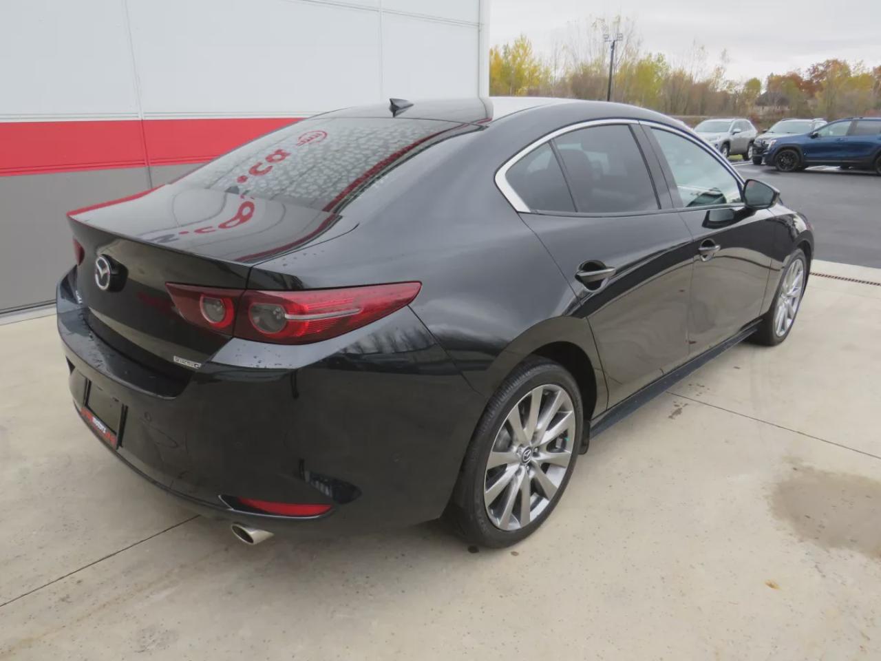 2020 Mazda MAZDA3 GT (**CLEAN TITLE/NO ACCIDENTS!!**SAFETY/CERTIFIED!!**ALLOY RIMS**NAVIGATION**LEATHER**SUNROOF**POWER SEATS**HEADS UP DISPLAY**HEATED SEATS**HEATED STEERING WHEEL**PUSH BUTTON START**BOSE SOUND SYSTEM**DUAL CLIMATE CONTROL**MEMORY SEATING**REVERSE CAMERA* Photo