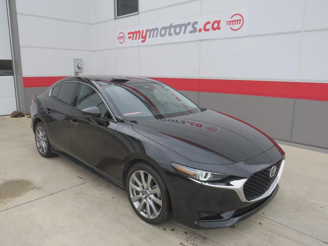 2020 Mazda MAZDA3 GT  | Clean Title | No Accidents | Safety Certified | Alloy Rims | Navigation | Leather | Sunroof | Power Seats | Heads Up Display | Heated Seats | Heated Steering Wheel | Push Button Start | Bose Sound System | Dual Climate Control | Memory Seating Photo