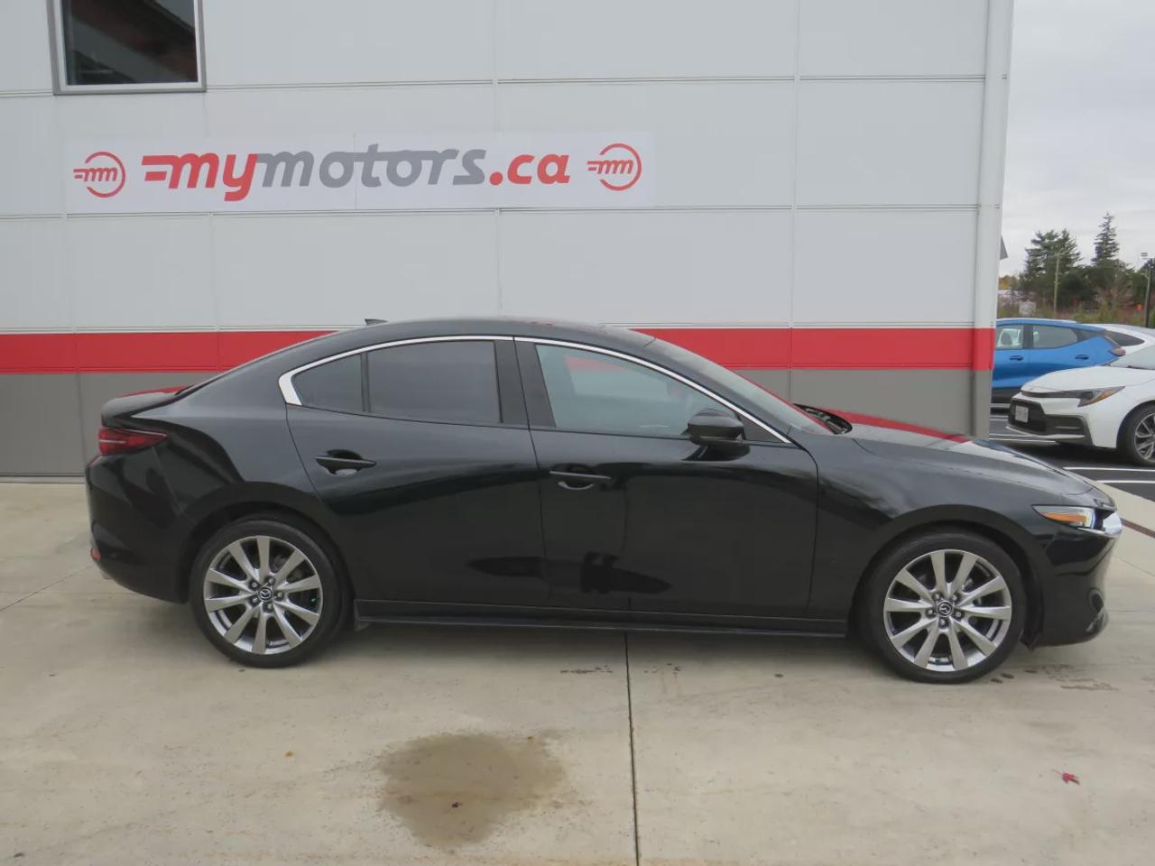 2020 Mazda MAZDA3 GT  | Clean Title | No Accidents | Safety Certified | Alloy Rims | Navigation | Leather | Sunroof | Power Seats | Heads Up Display | Heated Seats | Heated Steering Wheel | Push Button Start | Bose Sound System | Dual Climate Control | Memory Seating Photo