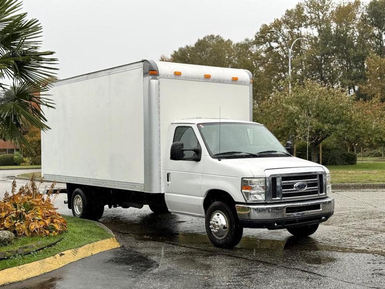 2013 Ford Econoline E450 16-foot cube van with a 5.4L V8 engine, automatic transmission, and rear-wheel drive. Equipped with air conditioning, AM/FM radio, and cloth interior. White exterior with grey cabin. The interior cargo area measures 16 long, 78 wide, and 73 high. Overall vehicle dimensions are 254 long, 8 wide, and 106 high. GVWR rated at 6,373 KG (14,050 LBS). Ideal for deliveries, moving, or commercial transport.  $26,870.00 plus $375 processing fee, $27,245.00 total payment obligation before taxes.   Listing report, warranty, contract commitment cancellation fee, financing available on approved credit (some limitations and exceptions may apply). All above specifications and information is considered to be accurate but is not guaranteed and no opinion or advice is given as to whether this item should be purchased. We do not allow test drives due to theft, fraud, acts of vandalism and undetectable impaired driving. Instead we provide the following benefits: Complimentary Warranty (with options to extend), Limited Money Back Satisfaction Guarantee on Fully Completed Contracts, Contract Commitment Cancellation, and an Open-Ended Sell-Back Option. Ask seller for details or call 604-522-REPO(7376) to confirm listing availability.
