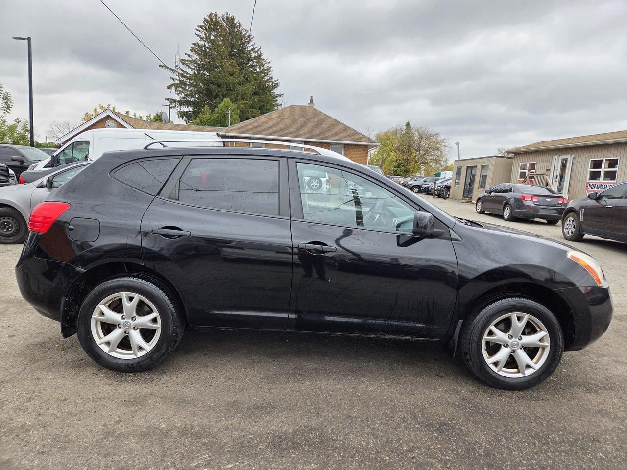 2009 Nissan Rogue SL, AWD, LEATHER, SUNROOF, ALLOYS, AS IS SPECIAL Photo