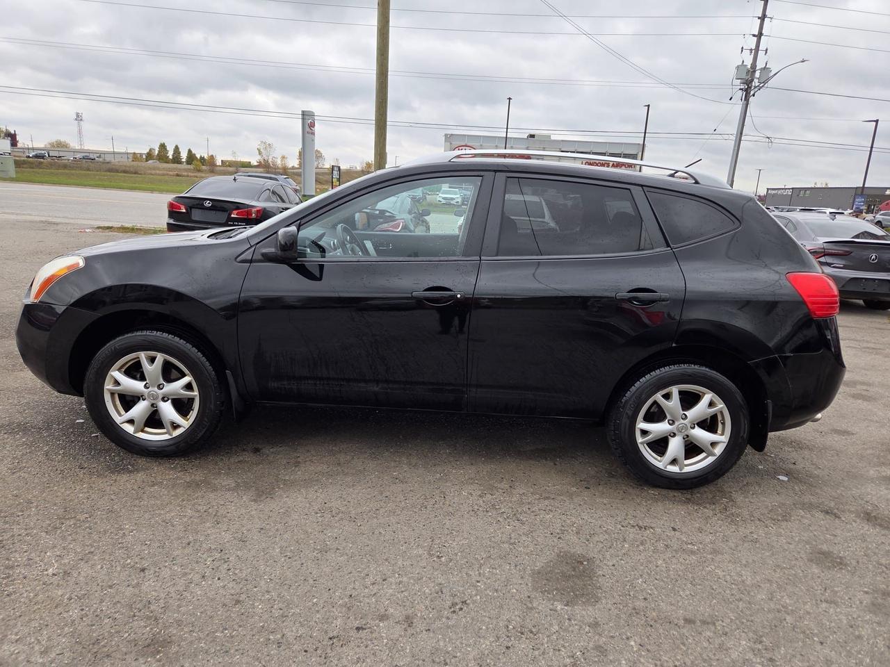 2009 Nissan Rogue SL, AWD, LEATHER, SUNROOF, ALLOYS, AS IS SPECIAL Photo