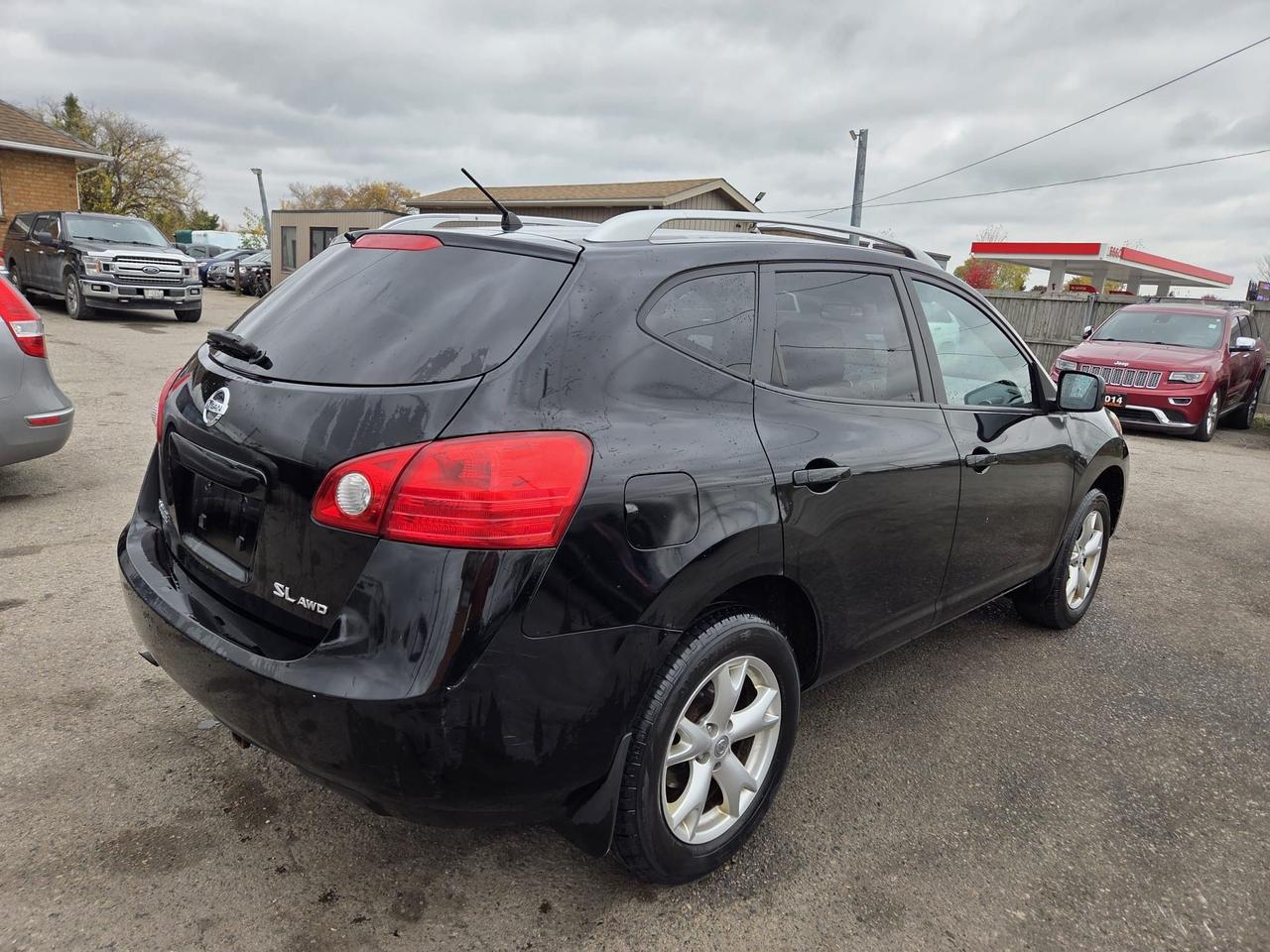 2009 Nissan Rogue SL, AWD, LEATHER, SUNROOF, ALLOYS, AS IS SPECIAL Photo