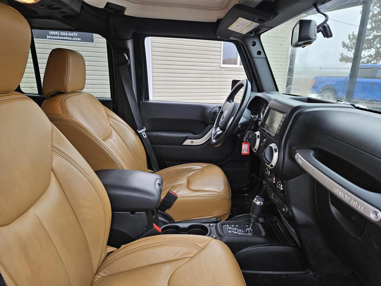 2016 Jeep Wrangler 4WD 4DR SAHARA Photo