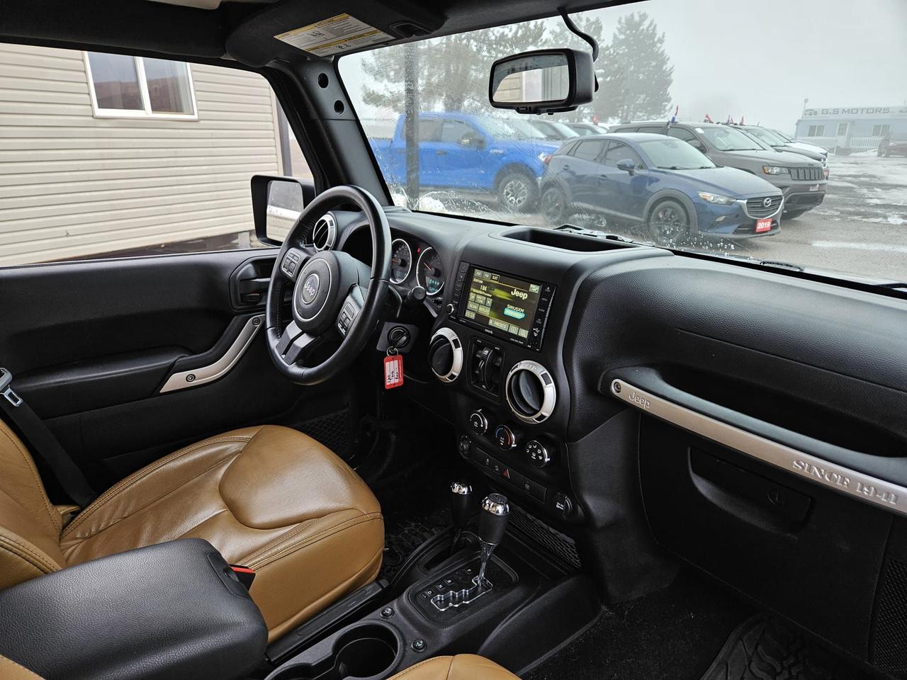 2016 Jeep Wrangler 4WD 4DR SAHARA Photo