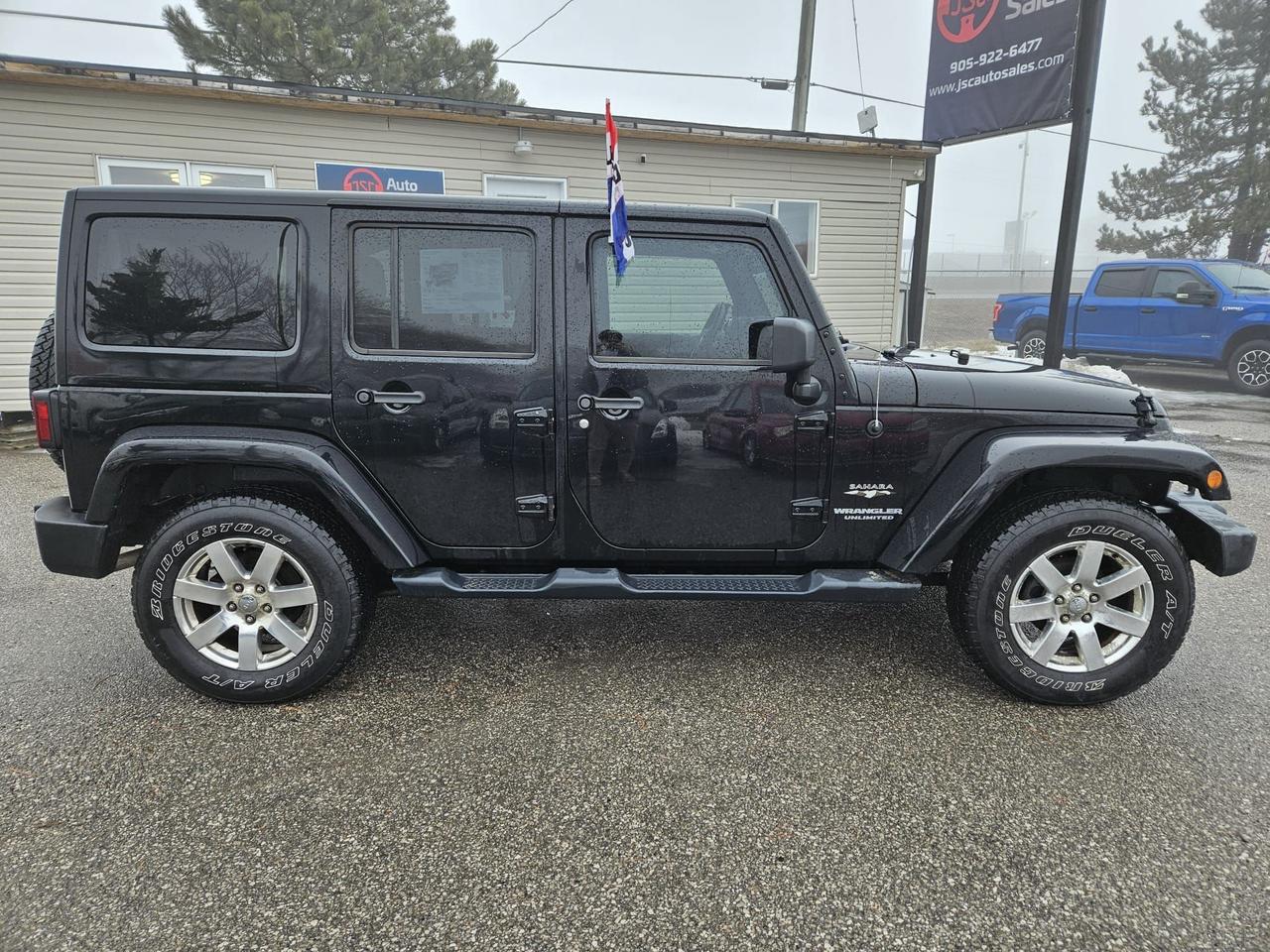 2016 Jeep Wrangler 4WD 4DR SAHARA Photo