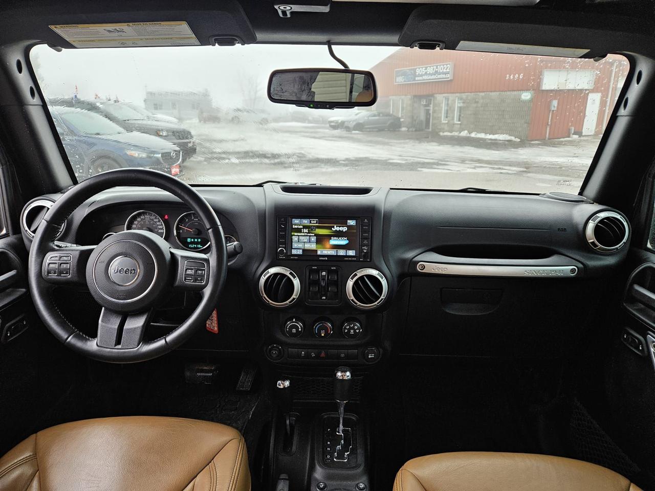 2016 Jeep Wrangler 4WD 4DR SAHARA Photo