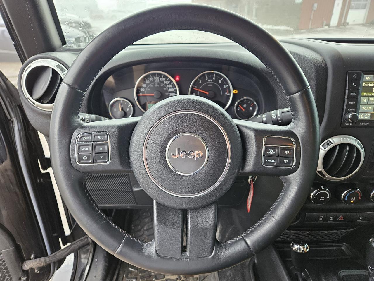 2016 Jeep Wrangler 4WD 4DR SAHARA Photo