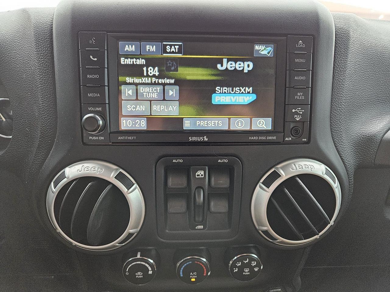 2016 Jeep Wrangler 4WD 4DR SAHARA Photo