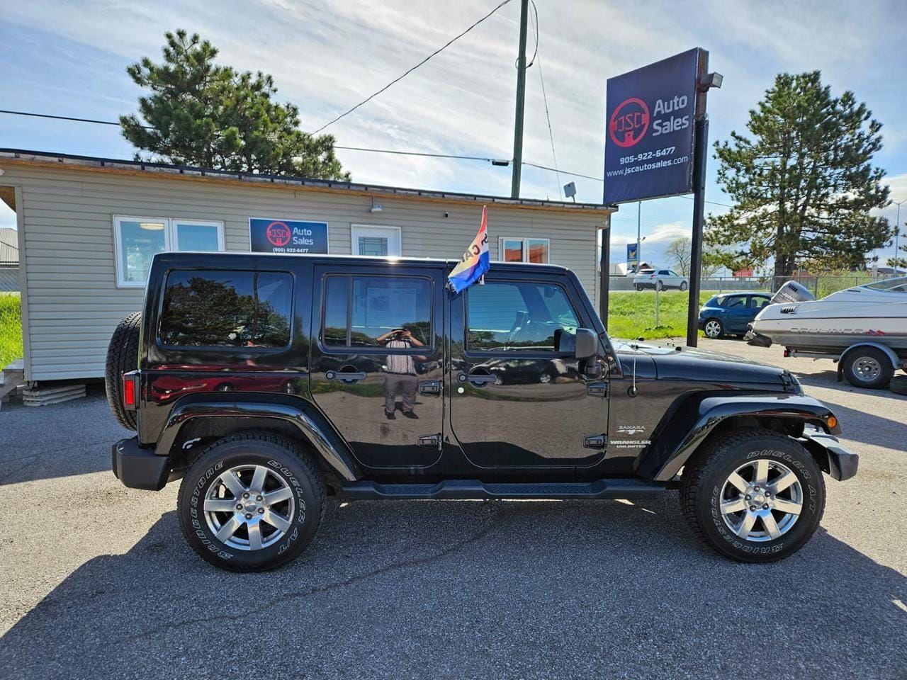 2016 Jeep Wrangler 4WD 4DR SAHARA Photo
