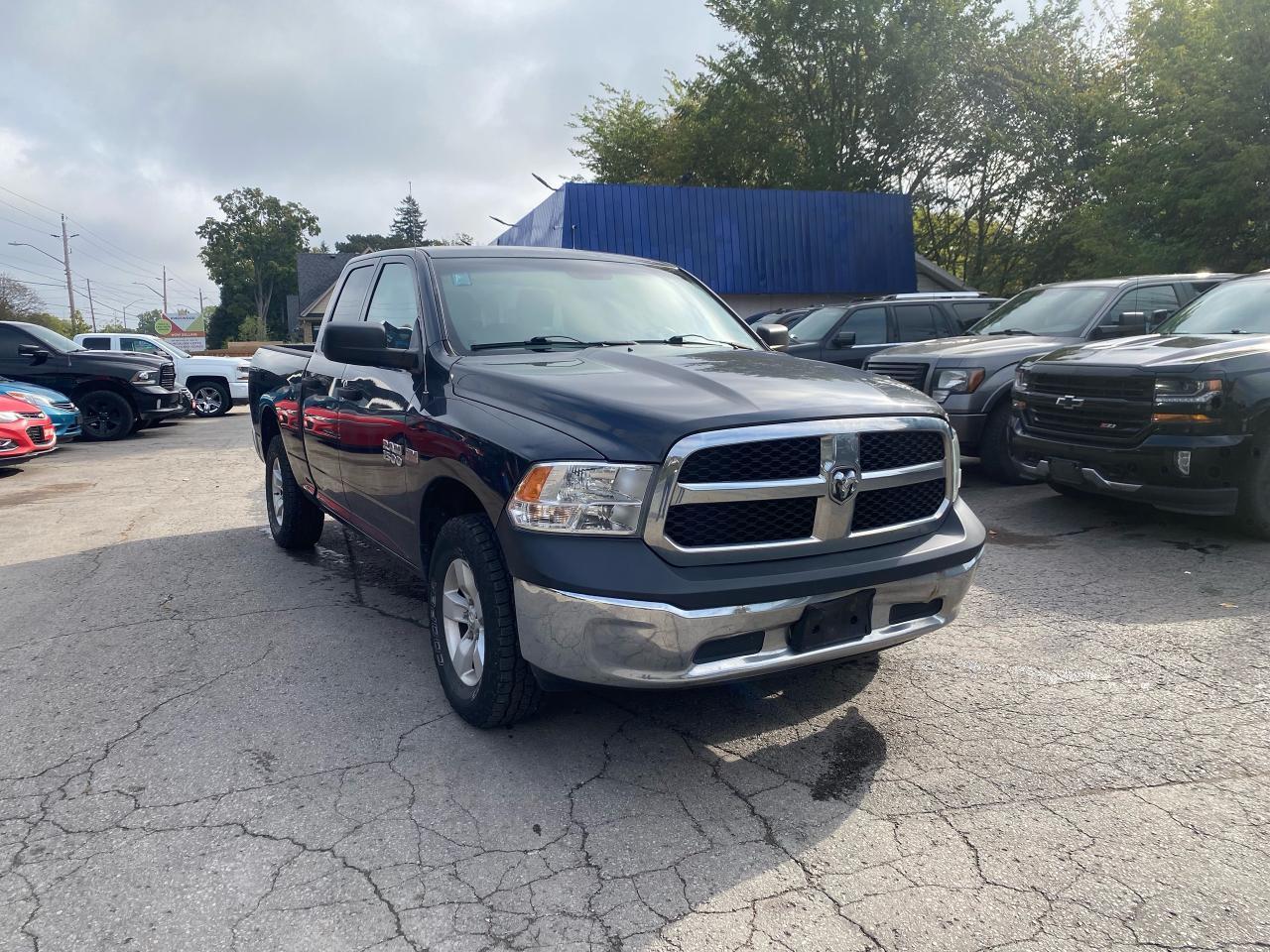 2015 RAM 1500 4WD QUAD CAB 140.5" ST - Photo #1