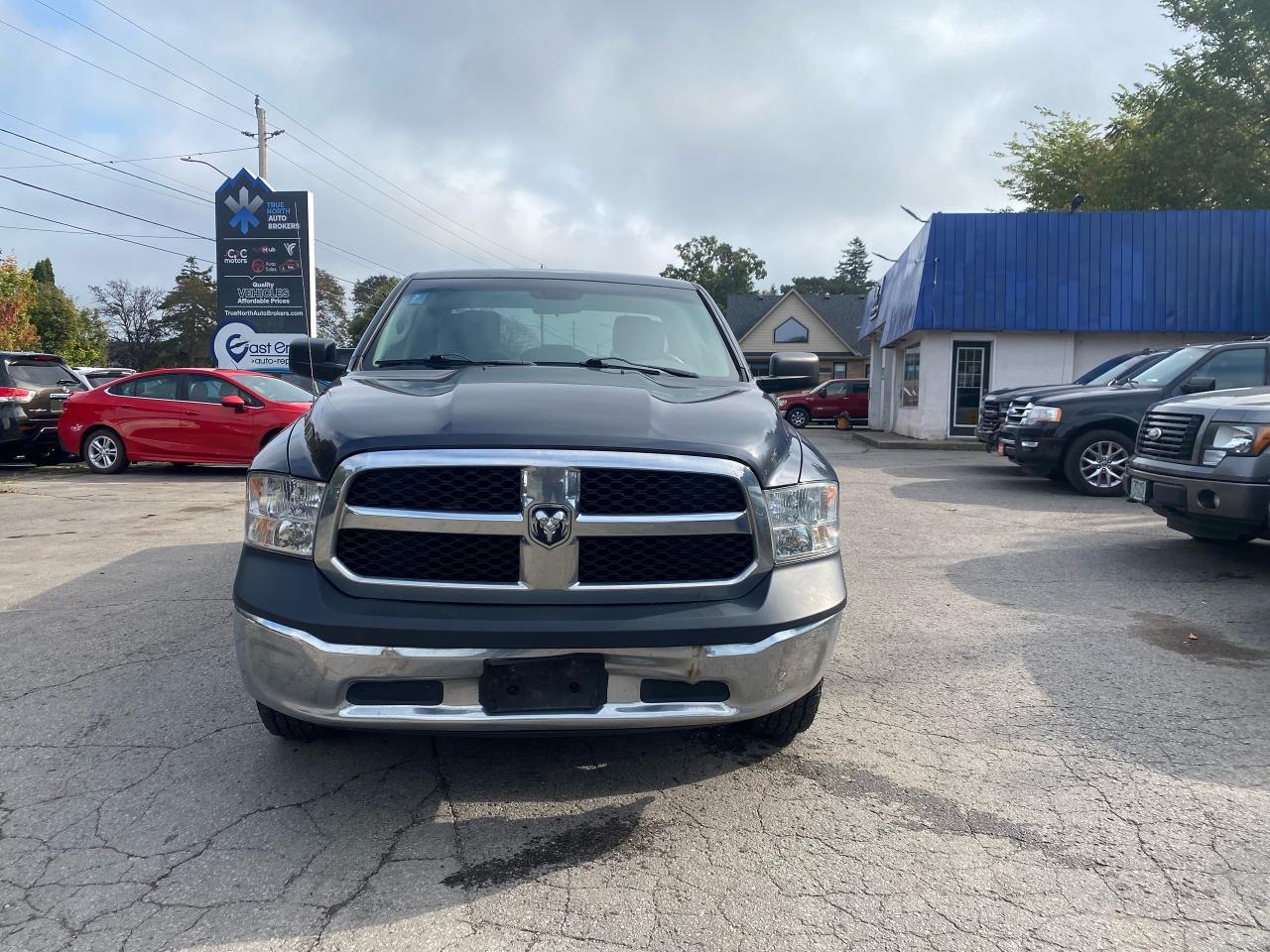 2015 RAM 1500 4WD QUAD CAB 140.5" ST - Photo #2
