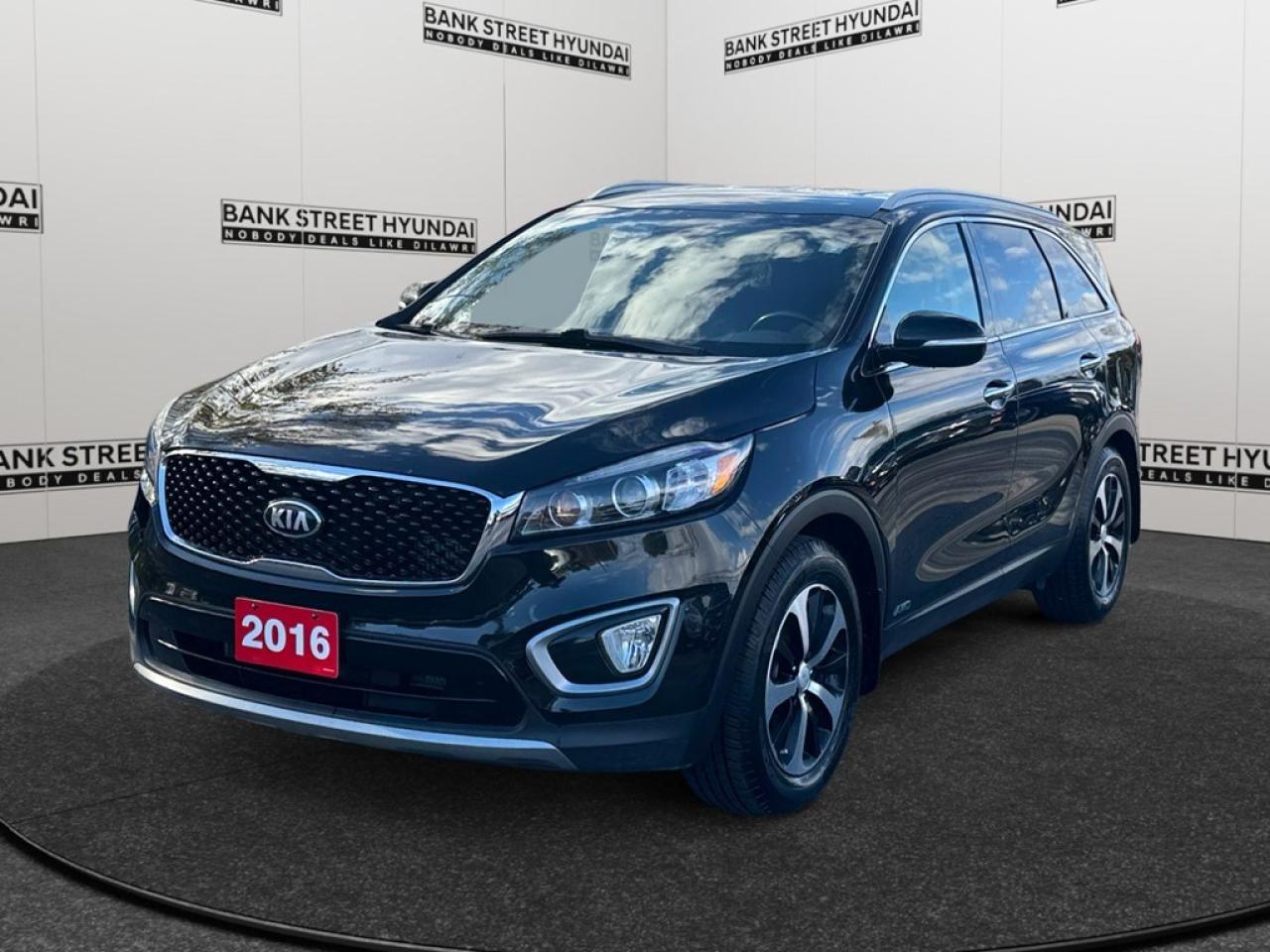 Step into the sleek sophistication of the 2016 Kia Sorento AWD 4dr 2.0L Turbo EX, a powerful SUV in a stunning black finish thats ready to conquer any road with its rugged all-wheel drive capabilities. The Sorentos exterior exudes confidence, with alloy wheels that add a touch of class while ensuring a stable ride. Inside, youll find a thoughtfully designed interior, featuring comfortable heated seats, and intuitive controls with smart device integration to keep you connected on the go. The spacious cabin, equipped with power seats, invites relaxation on long journeys, while keyless entry ensures convenience at every stop. This SUV is loaded with cutting-edge technology, such as a reliable backup camera and parking sensors to enhance maneuverability, and satellite radio to enjoy crystal-clear entertainment. Safety is a priority with integrated brake assist to support decisive stops, and cruise control to aid long-distance driving. Ideal for families needing a versatile vehicle or anyone who values performance and comfort, the 2016 Kia Sorento is a perfect match. Contact us today to arrange a test drive and experience what makes this vehicle exceptional.