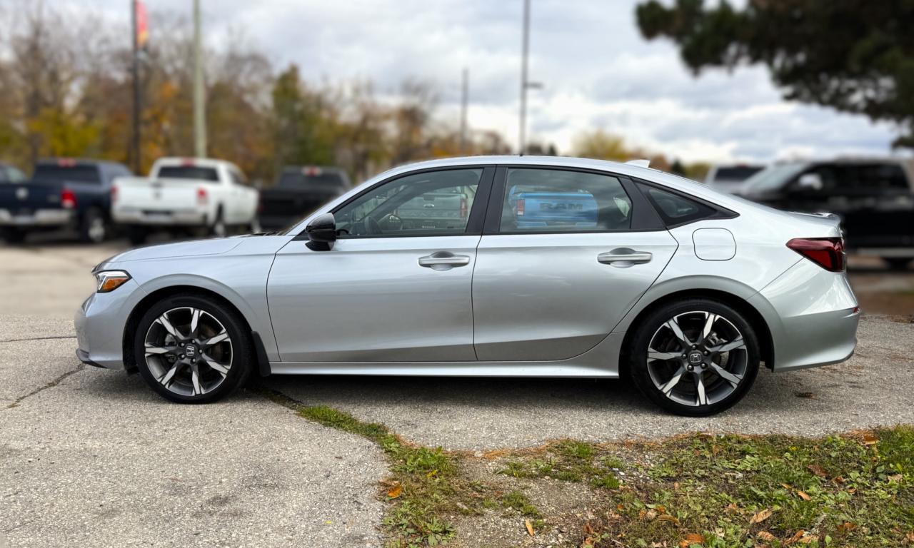 2025 Honda Civic Hybrid Sport Touring eCVT | NAVIGATION | Photo