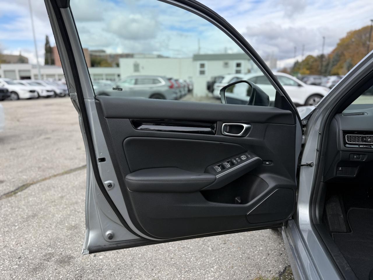 2025 Honda Civic Hybrid Sport Touring eCVT | NAVIGATION | Photo