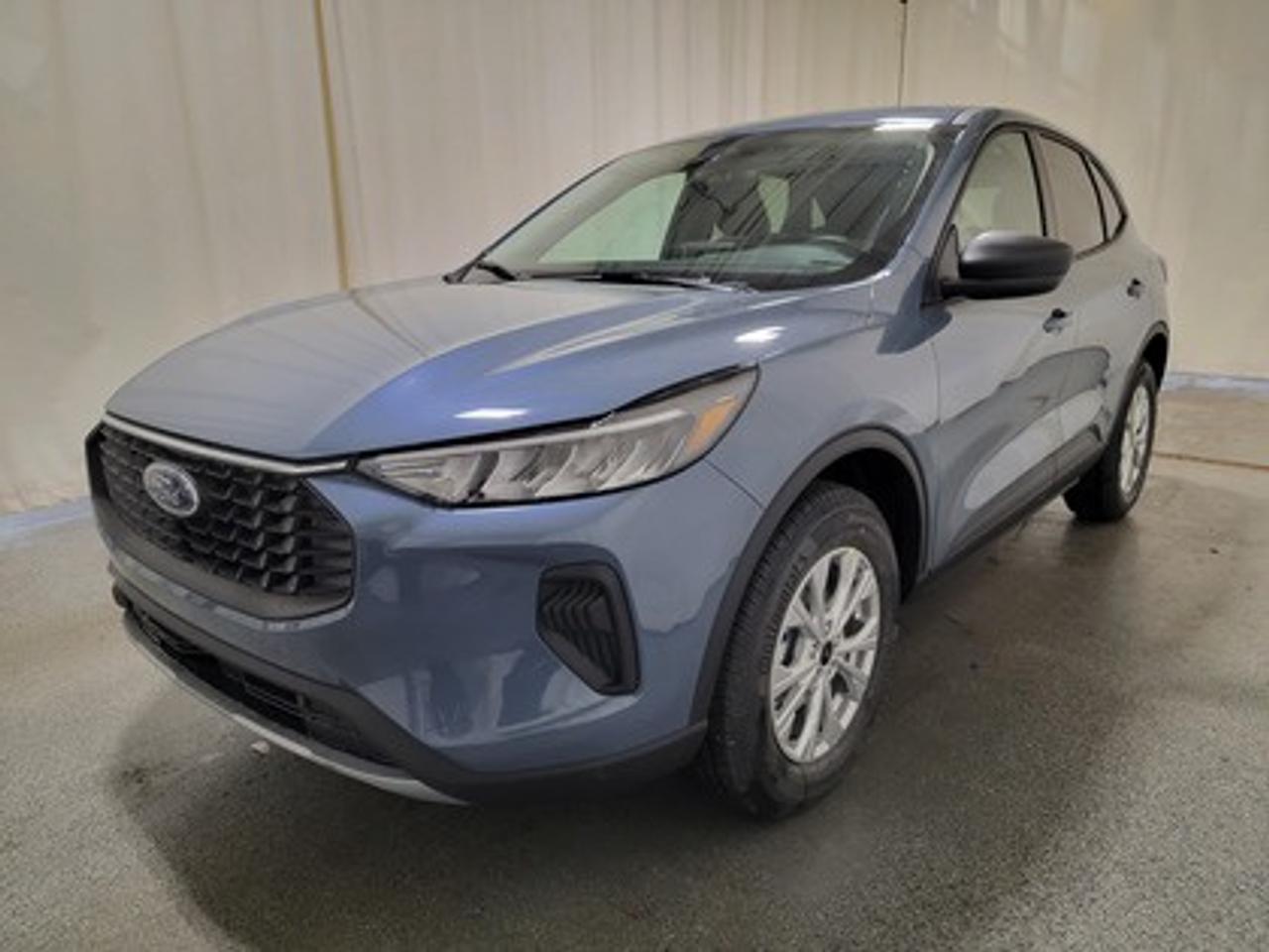 This all-new 2026 Escape Active 200A looks absolutely stunning in Vapor Blue Metallic. This 5-passenger All-wheel drive crossover comes equipped with the 1.5L EcoBoost® engine. This remarkable engine not only produces 181 horsepower and 190 ft-lbs of torque, but by leveraging EcoBoost® technology and an 8-speed automatic transmission, this crossover is rated to get an estimated 8.4L/100km (34 miles per gallon) combined highway/city fuel economy.

This vehicle comes with the All-Weather Packageready to take on any season! 

Snow, rain, mud, or sunshinethis vehicle is built for it all! The All-Weather Package adds extra protection where it matters most, with premium mud flaps to shield your paint from road debris, all-weather floor mats to protect your interior from lifes messes, and Xpel paint protection to help guard against those infuriating rock chips. Drive with confidence, knowing your investment is protected from Regina's elements. 

Key Features:
8 Instrument panel cluster
 All-wheel drive
Ford Co-Pilot360
Heated Front Seats
Remote Start
Heated Mirrors
SYNC® 4 W/8 LCD Capacitive Touchscreen
Wireless Apple CarPlay® and Android Auto Compatibility
Privacy Glass
17 Shadow Silver Painted Aluminum Wheels
Power Windows
LED Taillamps
LED Headlamps
FordPass Connect

Saskatchewan has a challenging climate, but the 2026 Escape Active is a tough SUV designed with features and technology that keep you comfortable and safe. This specific vehicle is loaded with 4-wheel disc brakes, 17 all season tires, Dual zone electronic climate control, AdvanceTrac® with RSC® (Roll Stability Control), AWD, BLIS® (Blind Spot Information System) with Cross-Traffic Alert with Braking, Electronic Traction Control, Active Grille Shutters, Lane-Keeping System, Pedestrian Detection, Driver Alert, Dynamic Brake Support, and more, ensuring you're prepared for any journey.

Bennett Dunlop Ford, proudly serving Regina for over 40 years, is conveniently located at 770 Broad Street. With over 3,500 Google reviews, our reputation reflects our commitment to providing a fast, easy, and enjoyable vehicle-buying experience. We eliminate the hassle with no admin or documentation fees, transparent upfront pricing that lets you shop with total confidence. But were more than just a dealershipwere driven to make a difference by supporting local community initiatives and events that matter to you. Visit Bennett Dunlop Ford today and experience why were Reginas trusted choice for quality vehicles, exceptional service, and a genuine commitment to driving change in our community!