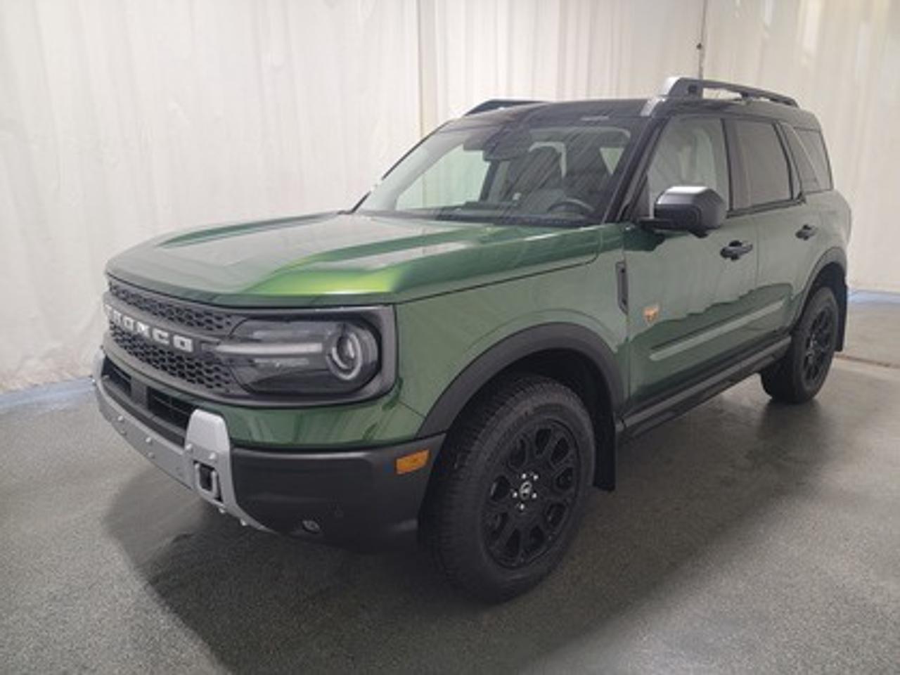 This all-new 2025 Ford Bronco Sport Badlands 400A stands out in Eruption Green Metallic,  showcasing a rugged yet refined look. This 5-passenger SUV is equipped with the 2.0L EcoBoost® engine, producing 250 horsepower and 277 lb-ft of torque. Paired with an 8-speed automatic transmission, this vehicle ensures seamless power delivery both on and off the road, it is engineered to conquer tough terrains with ease.

This vehicle comes with the All-Weather Packageready to take on any season! 

Snow, rain, mud, or sunshinethis vehicle is built for it all! The All-Weather Package adds extra protection where it matters most, with premium mud flaps to shield your paint from road debris, all-weather floor mats to protect your interior from lifes messes, and Xpel paint protection to help guard against those infuriating rock chips. Drive with confidence, knowing your investment is protected from Regina's elements. 

Key Features:
Advanced 4x4 with Terrain Management System and 7 G.O.A.T. Modes
Leather-Trimmed Sport Contour Heated Front Seats
Heated Premium-Wrapped Steering Wheel
Rubberized Floor and Cargo Area for Easy Cleaning
17 Matte Black-Painted Aluminum Wheels with All-Terrain Tires
Class II Trailer Tow Package with Trailer Sway Control
Ford Co-Pilot360 Assist 2.0, including:
360-Degree Camera with Trail View
Reverse Brake Assist
Front Parking Sensors
12.3 Digital Instrument Panel Cluster
SYNC® 4 with a 13.2 Center Display, featuring Wireless Apple CarPlay® and Android Auto
Trail Control with One-Pedal Driving
Power Moonroof
Badlands Tech Package

Bennett Dunlop Ford, proudly serving Regina for over 40 years, is conveniently located at 770 Broad Street. With over 3,500 Google reviews, our reputation reflects our commitment to providing a fast, easy, and enjoyable vehicle-buying experience. We eliminate the hassle with no admin or documentation fees, transparent upfront pricing, and a money-back guarantee that lets you shop with total confidence. But were more than just a dealershipwere driven to make a difference by supporting local community initiatives and events that matter to you. Visit Bennett Dunlop Ford today and experience why were Reginas trusted choice for quality vehicles, exceptional service, and a genuine commitment to driving change in our community!