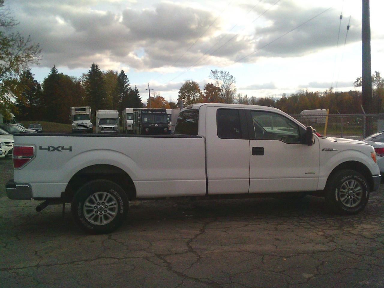 2012 Ford F-150 4WD SuperCab 163 XLT w-Midbox Prep + TOW PKG Photo