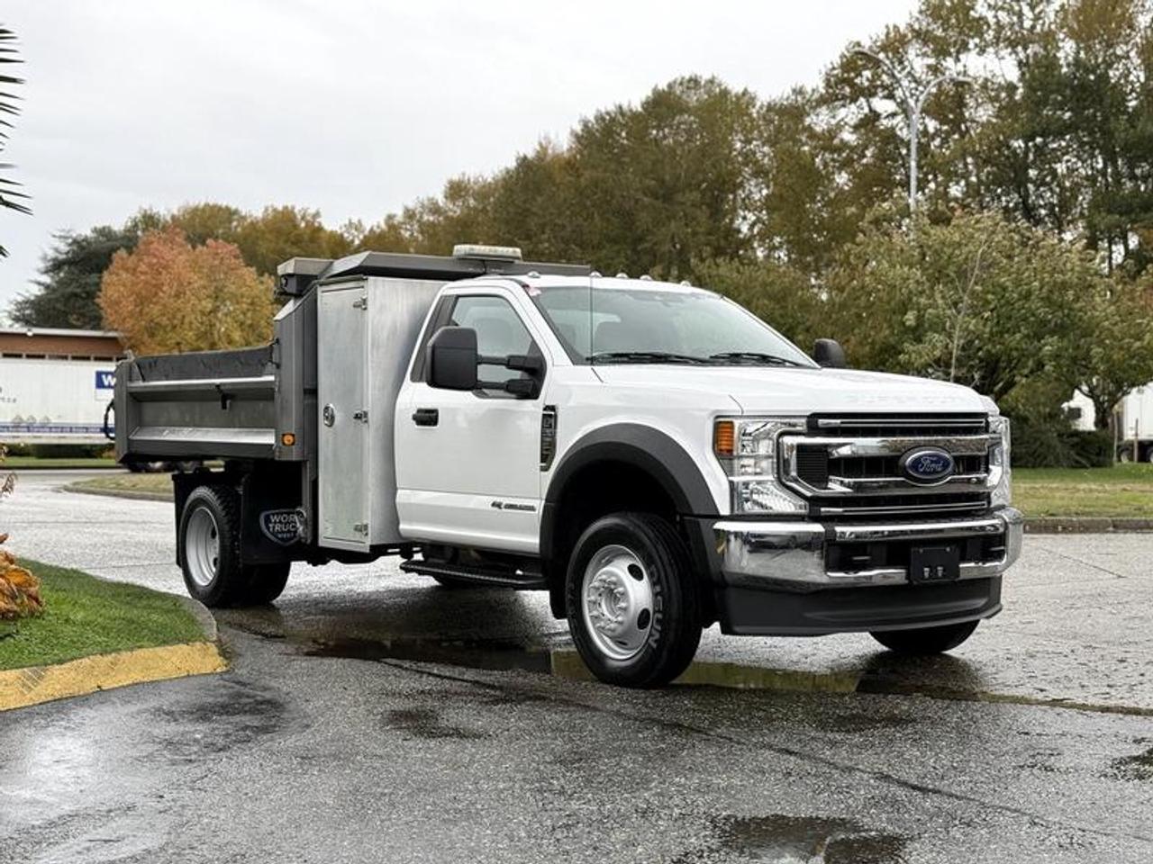 2021 Ford F-550 XL Super Duty 4X4 equipped with a 6.7L Power Stroke diesel engine, automatic transmission, and dual rear wheels. This 2-door work truck features a 9-foot dump bed with storage compartments, awning-style dump cover, beacon light, tow package, and AUX switches. The cab includes air conditioning, cruise control, AM/FM radio, power windows, door locks, and mirrors. GVWR rated at 8,845 KG (19,500 LB). Measures 222 long, 8 wide, and 78 high. Ideal for municipal or contractor use. This item is currently OFFSITE. You must register an appointment with our office to schedule an offsite viewing. Appointments must be made a minimum of one business day in advance (and as defined by the days that Repo.com is open for business) before your appointment can be scheduled and confirmed. We may, at our own discretion, instead opt to transport smaller items to Repo.coms main yard for viewing purposes.  $87,850.00 plus $375 processing fee, $88,225.00 total payment obligation before taxes.  Listing report, warranty, contract commitment cancellation fee, financing available on approved credit (some limitations and exceptions may apply). All above specifications and information is considered to be accurate but is not guaranteed and no opinion or advice is given as to whether this item should be purchased. We do not allow test drives due to theft, fraud, acts of vandalism and undetectable impaired driving. Instead we provide the following benefits: Complimentary Warranty (with options to extend), Limited Money Back Satisfaction Guarantee on Fully Completed Contracts, Contract Commitment Cancellation, and an Open-Ended Sell-Back Option. Ask seller for details or call 604-522-REPO(7376) to confirm listing availability.