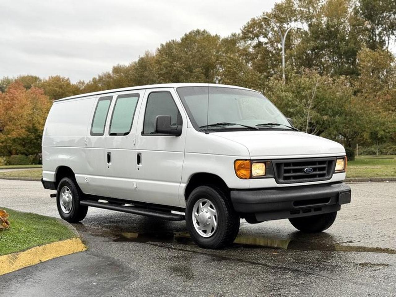 2006 Ford Econoline E-250 rear-wheel drive cargo van powered by a 4.6L V8 engine with automatic transmission. Features cruise control, air conditioning, 4-wheel ABS, AM/FM radio, power windows, power locks, and power mirrors. White exterior with grey cloth interior. Built for hauling tools, equipment, and cargo with ease. Measures 19 feet 4 inches long and 6 feet 8 inches wide.  $6,730.00 plus $375 processing fee, $7,105.00 total payment obligation before taxes.   Listing report, warranty, contract commitment cancellation fee, financing available on approved credit (some limitations and exceptions may apply). All above specifications and information is considered to be accurate but is not guaranteed and no opinion or advice is given as to whether this item should be purchased. We do not allow test drives due to theft, fraud, acts of vandalism and undetectable impaired driving. Instead we provide the following benefits: Complimentary Warranty (with options to extend), Limited Money Back Satisfaction Guarantee on Fully Completed Contracts, Contract Commitment Cancellation, and an Open-Ended Sell-Back Option. Ask seller for details or call 604-522-REPO(7376) to confirm listing availability.