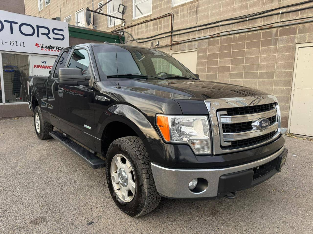 Used 2014 Ford F-150 4WD SuperCab 145 XLT for sale in Calgary, AB