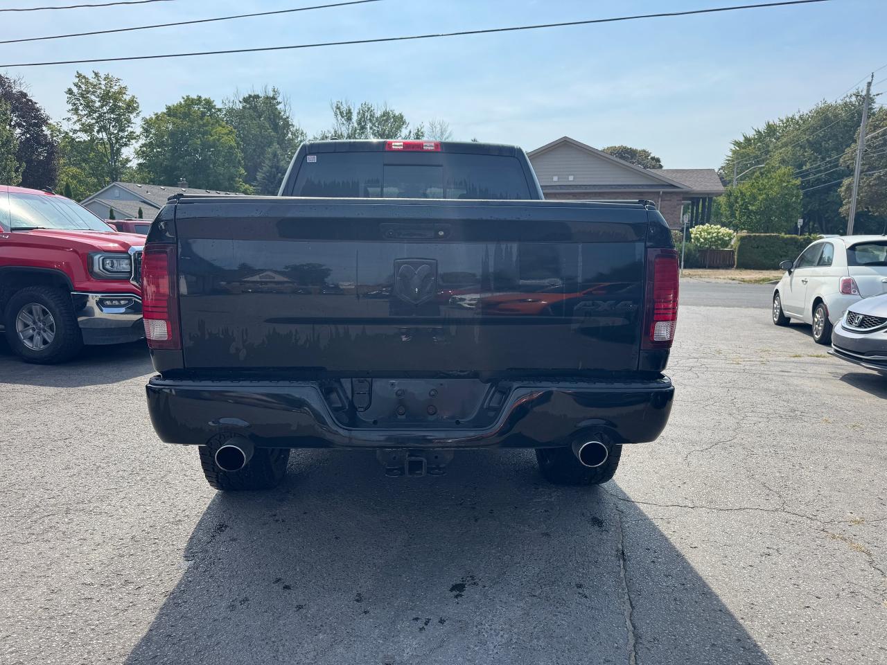 2014 RAM 1500 4WD Crew Cab 140.5" Sport - Photo #6