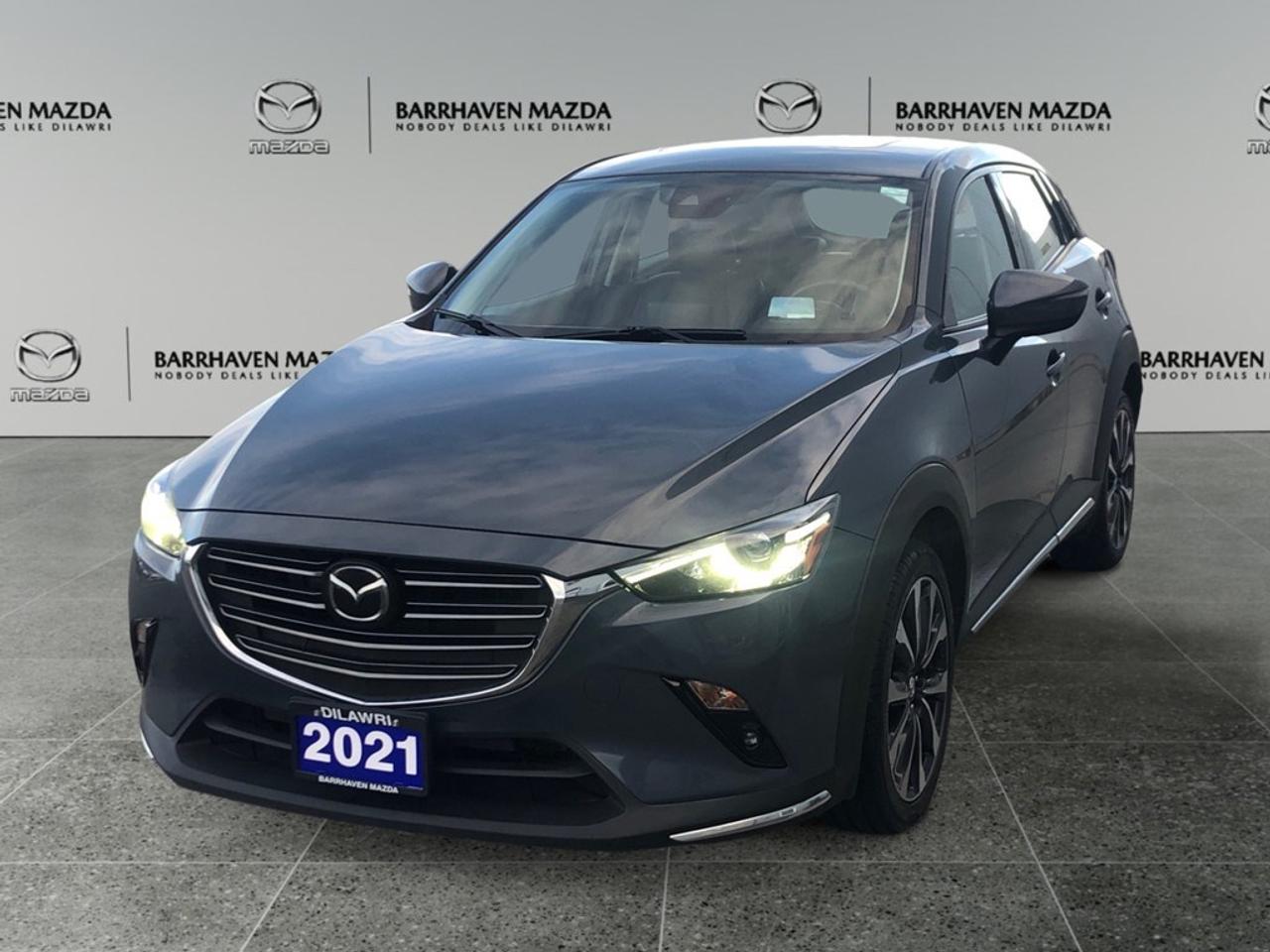 Introducing the impressive 2021 Mazda CX-3 GT in a stylish gray finish, equipped with AWD for exceptional handling on any terrain. Under the hood, the 2.0L 4-cylinder engine delivers a robust 148 HP, offering a thrilling yet smooth driving experience with its automatic transmission. The exterior shines with eye-catching alloy wheels and a sleek sunroof that perfectly complements the SUVs modern design. Inside, indulge in the luxury of leather seats that offer optimal comfort, while the leather steering wheel and gear shifter add a touch of sophistication. The convenience of power seats and keyless entry enhances your driving pleasure. This Mazda CX-3 GT model is outfitted with cutting-edge technology. Effortlessly manage your journey with a state-of-the-art navigation system, smart device integration, and enjoy quality listening with satellite radio. Safety is a priority, featuring a backup camera, brake assist, lane assist, and adaptive cruise control to support confident driving. The heads-up display and heated mirrors are also available to keep you focused on the road. This SUV is perfect for the modern adventurer, whether youre navigating city streets or exploring natures paths. Contact our dealership today and take the first step towards owning this exceptional vehicle!