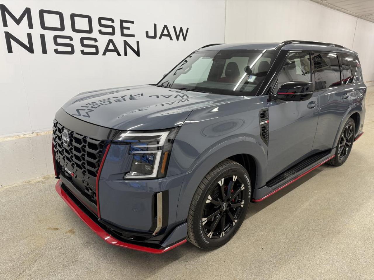 Experience the thrill of innovation and performance with the brand new 2026 Nissan Armada Nismo, now available at Moose Jaw Nissan in Moose Jaw. This full-size SUV combines the legendary capability of the Armada with Nismos motorsport-inspired enhancements, delivering a bold presence and advanced engineering for drivers seeking excitement and versatility in every journey.

FEATURES OF THE Armada Nismo  
»» Exclusive Nismo STLH exterior colour  
»» 9-speed automatic transmission with paddle shifters  
»» 3.5L V6 twin-turbo engine for dynamic power  
»» All-wheel drive for superior traction  

ADVANCED SAFETY FEATURES  
»» Forward collision warning with emergency braking  
»» Blind spot monitoring for safer lane changes  
»» Rear cross-traffic alert for reversing confidence  
»» Intelligent cruise control for stress-free highway driving  

PERFORMANCE AND EFFICIENCY  
»» 3.5L V6 twin-turbo delivers robust acceleration  
»» 9-speed automatic transmission for smooth shifting  
»» All-wheel drive system adapts to road conditions  
»» Paddle shifters for a sportier driving experience  

COMFORT AND CONVENIENCE  
»» Tri-zone automatic climate control for all passengers  
»» Power-adjustable drivers seat for personalized comfort  
»» Keyless entry and push-button start system  
»» Spacious seating for up to eight occupants  

TECHNONOLGY AND CONNECTIVITY  
»» Large touchscreen infotainment with navigation system  
»» Apple CarPlay and Android Auto integration  
»» Premium audio system for immersive sound  
»» Multiple USB ports for device charging  

CARGO SPACE  
»» Generous rear cargo area for luggage and gear  
»» Split-folding rear seats for flexible storage  
»» Flat load floor for easy packing  
»» Ample space for family, sports, or travel needs  

WHAT OTHER OWNERS LIKE  
»» Confident handling and powerful acceleration  
»» Advanced safety features for peace of mind  
»» Spacious interior for families and groups  
»» User-friendly technology and connectivity options  

This 2026 Nissan Armada Nismos VIN is: JN8AY3FBXT9123381.