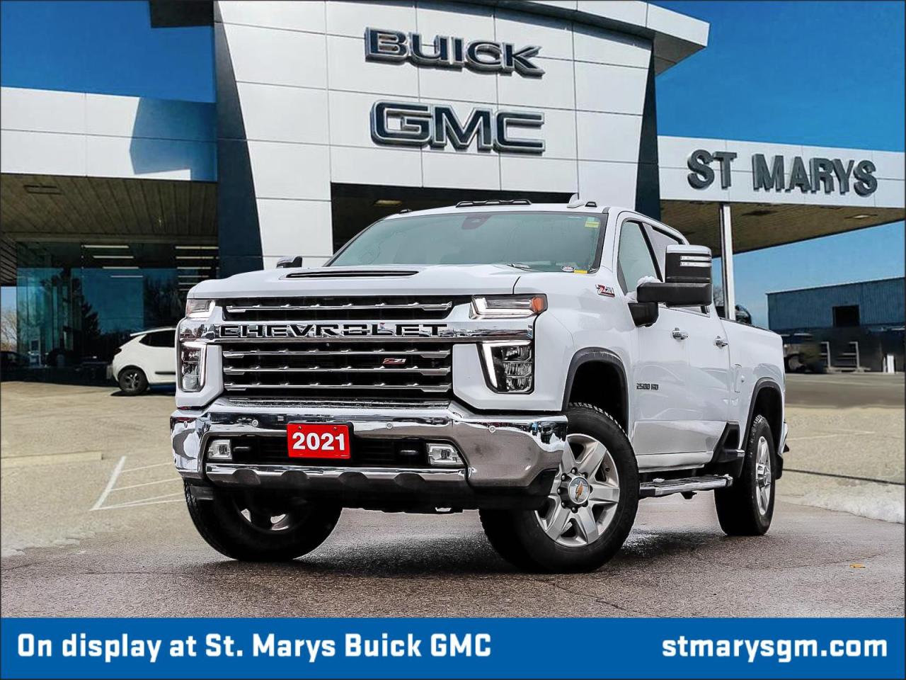 <h1>2021 Chevrolet Silverado 2500HD LTZ</h1><p>The 2021 Chevrolet Silverado 2500HD LTZ exemplifies rugged strength and modern refinement, making it a top choice in the heavy-duty truck segment. This exceptional vehicle is powered by the formidable Duramax 6.6L Turbo-Diesel V8 engine, delivering unparalleled performance for both work and recreation.</p><h2>Key Features</h2><ul><li><strong>Powerful Duramax Engine:</strong> The 6.6L Turbo-Diesel V8 generates robust horsepower and torque, ensuring impressive towing and hauling capabilities.</li><li><strong>Advanced Towing Technology:</strong> Equipped with a comprehensive suite of towing aids, including integrated trailer brake controller and a high-definition rear vision camera.</li><li><strong>Luxury Interior:</strong> The LTZ trim showcases premium leather-appointed seating, heated and ventilated front seats, and quality soft-touch materials throughout.</li><li><strong>Infotainment System:</strong> Chevrolet Infotainment 3 system with a large touchscreen, Apple CarPlay, Android Auto, and Bluetooth connectivity for seamless tech integration.</li><li><strong>Safety Features:</strong> Includes forward collision alert, lane departure warning, and a suite of available driver assistance technologies for enhanced safety.</li></ul><h2>Design</h2><p>The 2021 Silverado 2500HD LTZ combines bold, muscular styling with aerodynamic efficiency. Its strong front grille and high-strength steel body create a commanding road presence, while the signature LED daytime running lights and dual exhaust outlets add a touch of sophistication. With a variety of available colors, including striking metallic finishes, this truck makes a statement wherever it goes.</p><h2>Performance</h2><p>At the heart of the Silverado 2500HD LTZ is the highly regarded Duramax 6.6L Turbo-Diesel V8. With its innovative design and advanced technology, this engine delivers exceptional torque and power, making it ideal for heavy-duty tasks without sacrificing efficiency. Paired with a robust Allison 10-speed automatic transmission, it provides seamless driving experiences, whether on the highway or off the beaten path. The available 4WD system enhances traction and control, ensuring confidence in any terrain.</p><h2>Conclusion</h2><p>The 2021 Chevrolet Silverado 2500HD LTZ sets the standard for heavy-duty pickups. With its powerful engine, luxurious features, and advanced safety technologies, it's designed to meet the demands of hard-working professionals while providing comfort and style for everyday driving.</p>