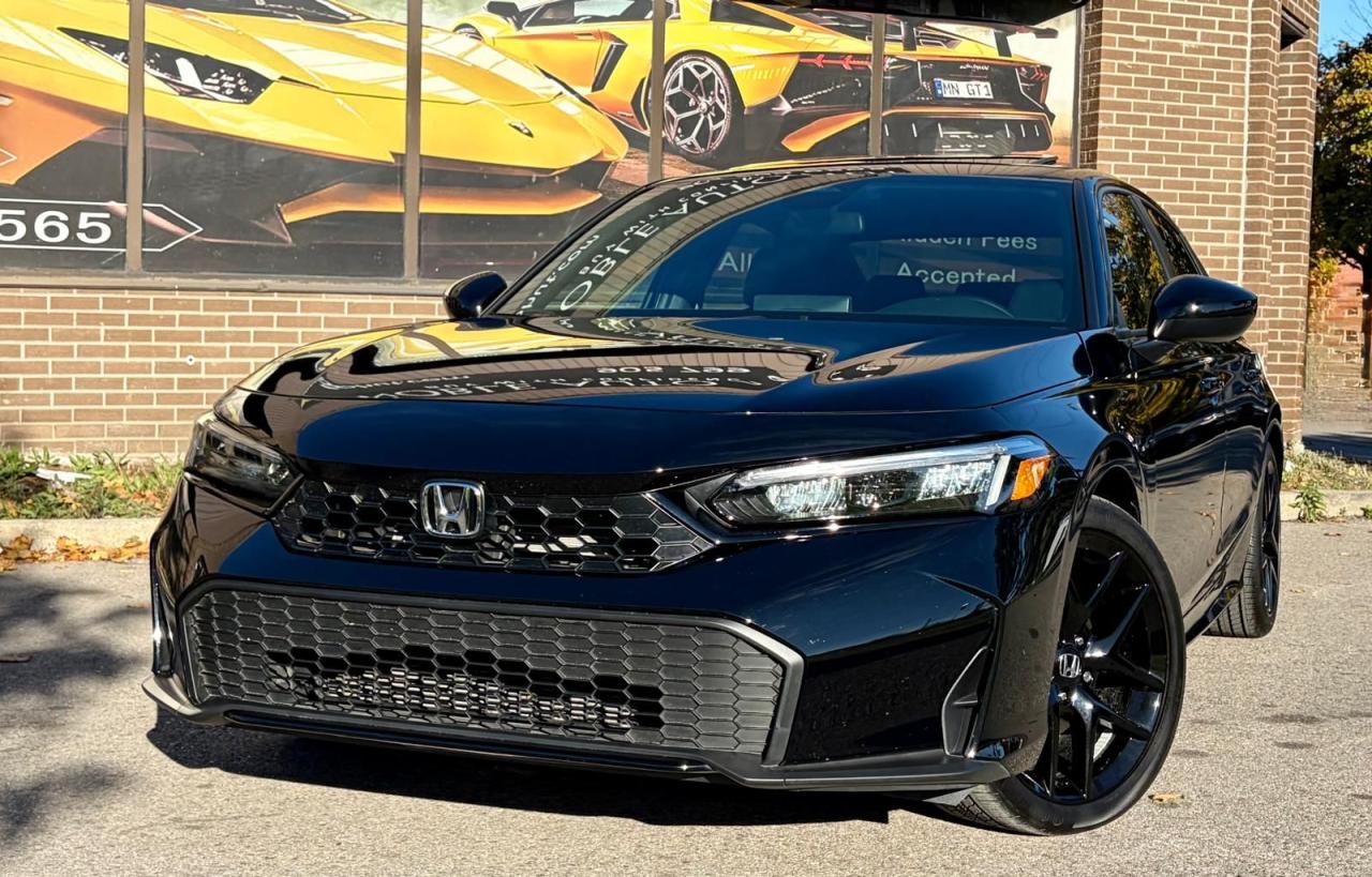 2025 Honda Civic Sport Photo2