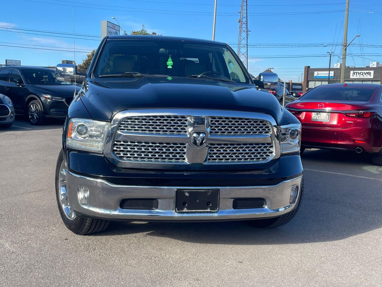 2015 RAM 1500 4WD Crew Cab 140.5" Laramie NAVIGATION LEATHER Photo4