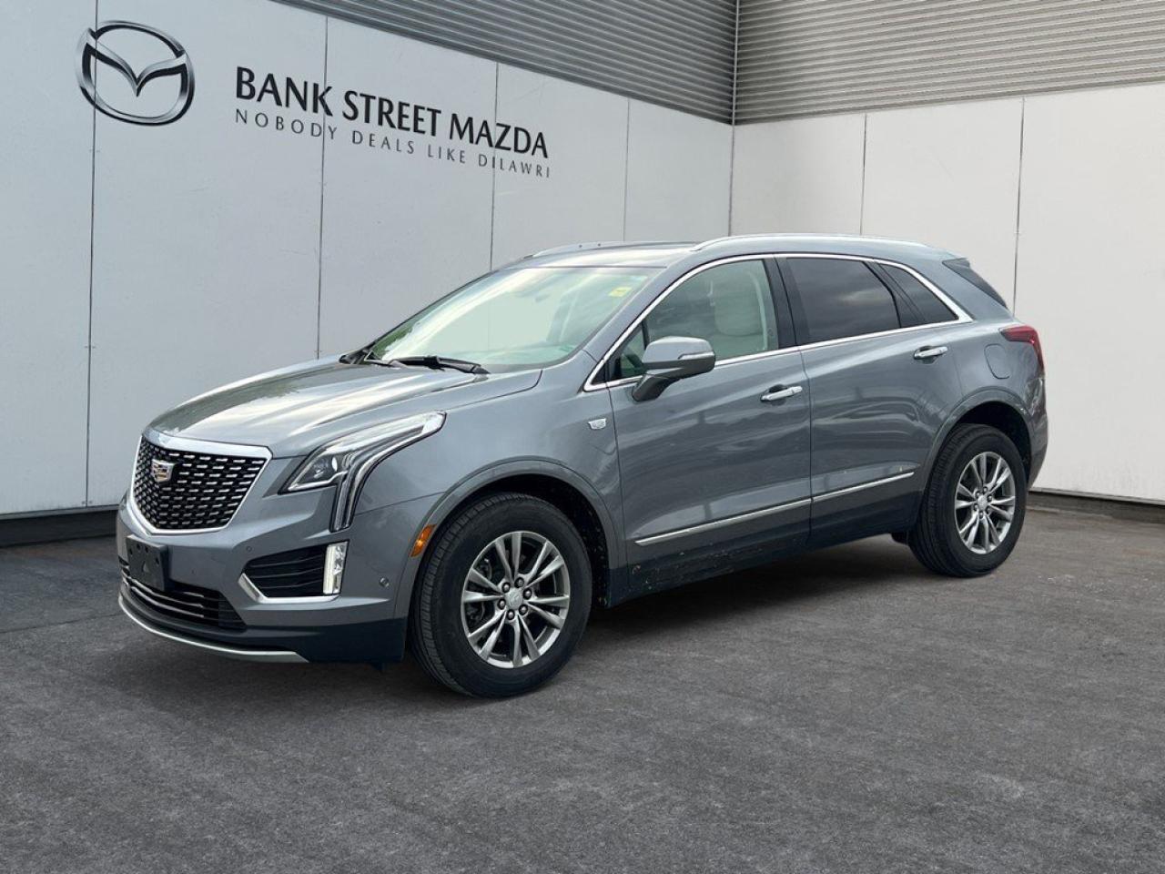 Introducing the 2021 Cadillac XT5 AWD Premium Luxuryan exquisite SUV that captures attention with its sleek design and all-wheel-drive capability. This model boasts a powerful 3.6L 6-cylinder engine, providing 310 horsepower to ensure both a responsive and exhilarating drive. The upscale exterior of the Cadillac XT5 is matched by an equally impressive interior, featuring luxurious leather seats, heated front seats, and a heated steering wheel for ultimate comfort during the cold Canadian winters. With its sunroof/moonroof, this SUV allows you to enjoy the natural light as you cruise down the road. Technology-forward, this XT5 comes equipped with a host of high-tech features, including a backup camera, Bluetooth connection, smart device integration, and a Wi-Fi hotspot for constant connectivity on the go. Safety is paramount with lane assist, parking sensors, and a comprehensive suite of advanced assistance features designed to enhance your driving experience. Perfect for the discerning driver seeking sophistication, performance, and advanced technology, the 2021 Cadillac XT5 AWD Premium Luxury is a compelling choice. Reach out to our dealership today to schedule your personal test drive and experience this remarkable SUV for yourself!