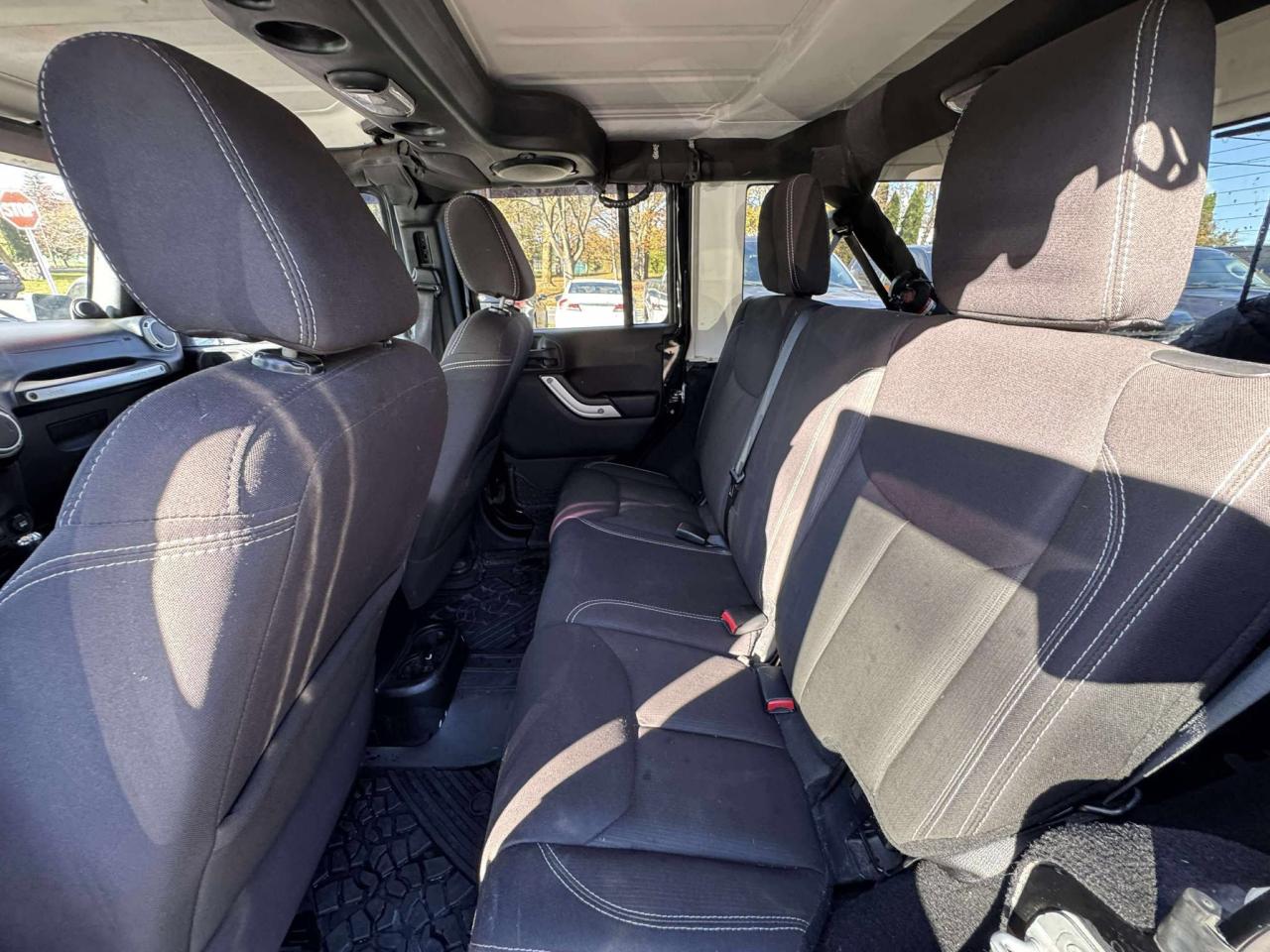 2014 Jeep Wrangler Unlimited Sahara - Photo #12