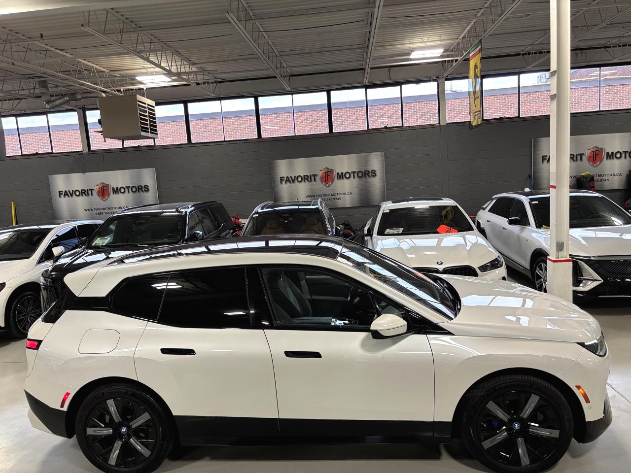 2023 BMW iX xDrive40|AWD|BLUESUEDEINTERIOR|FRONTPPF|MASSAGE|+ Photo3